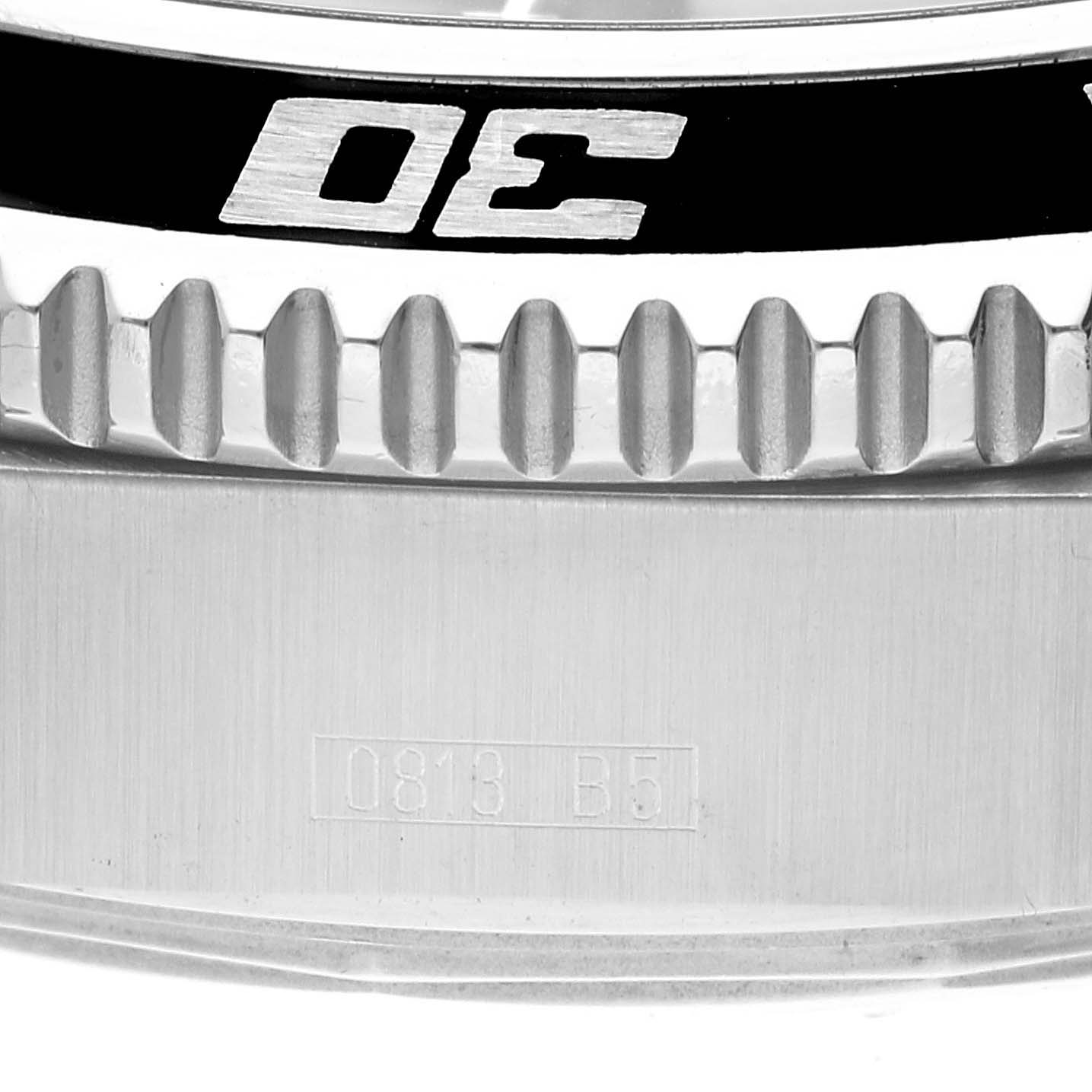 This close-up shows the bezel and part of the casing with the serial number of the Breitling Superocean A17391 Men's Stainless Steel Black Dial A17391 Men's Stainless Steel Black Dial watch.
