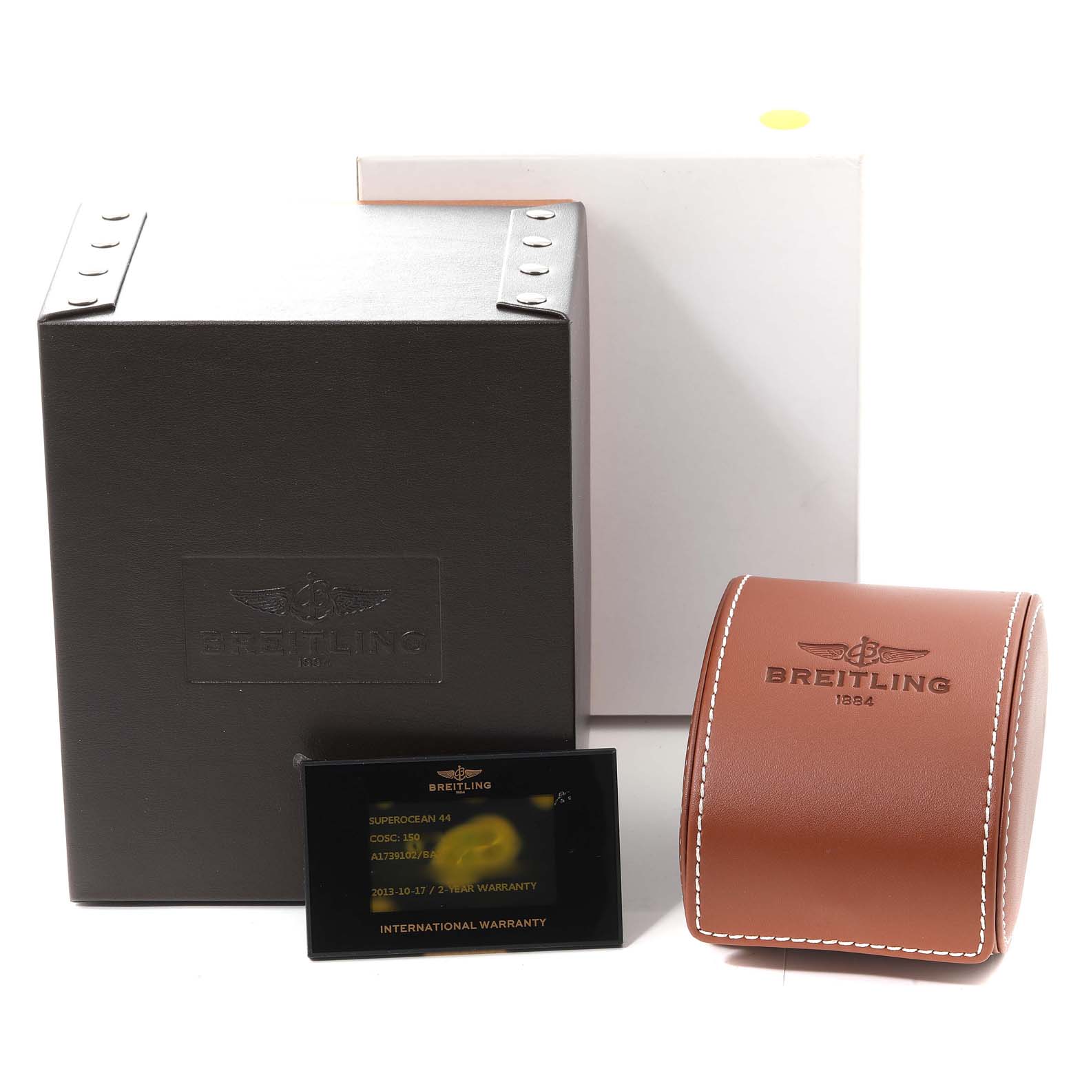 The image shows a Breitling Superocean A17391 Men's Stainless Steel Black Dial A17391 Men's Stainless Steel Black Dial watch box, a leather case, an international warranty card, and an outer white box.