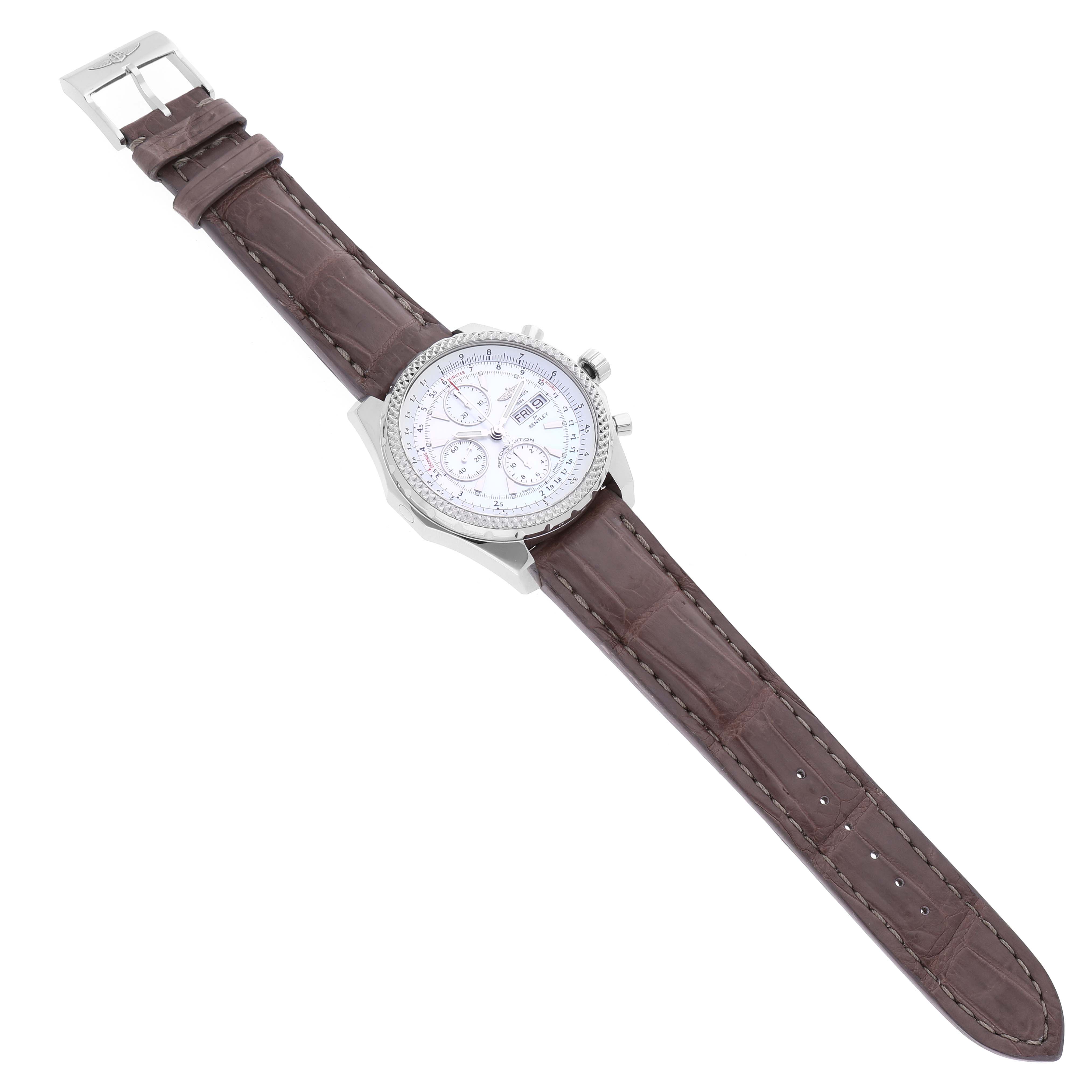 The image shows a top-down view of a Bentley model watch by Breitling, highlighting the brown leather strap and silver dial.