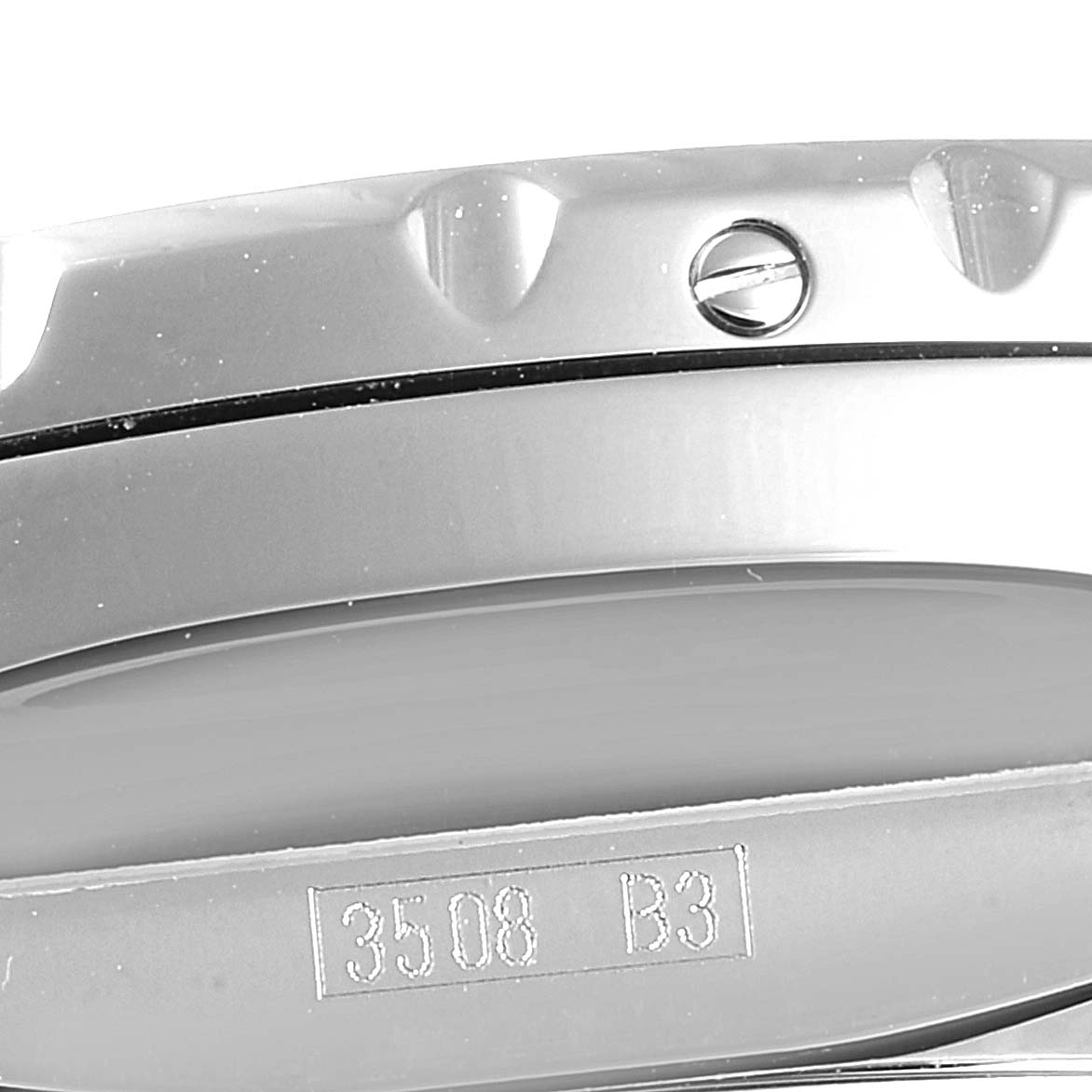 The image shows a close-up of the side of a Bentley model by Breitling, highlighting the bezel and engraved details.