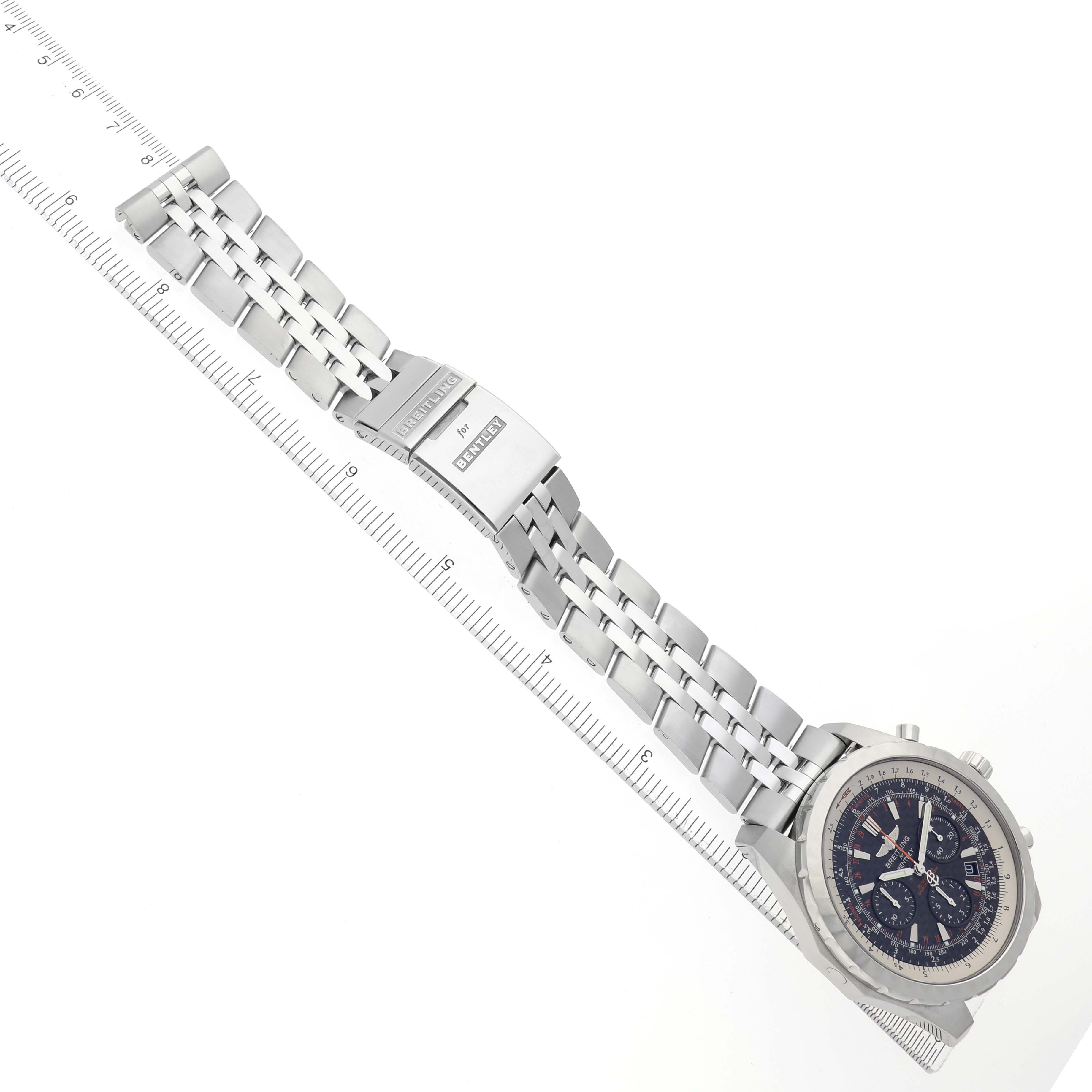 The image shows a Breitling Bentley model A25365 men
s watch at an angle, displaying the face, bezel, bracelet, and clasp extended over a ruler for scale.