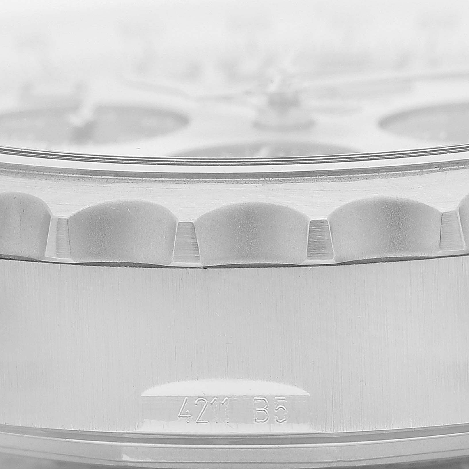 The image shows a close-up side view of the bezel and part of the case of a Breitling Professional Series A23360 Men
s Stainless Steel Silver Dial A23360 Men
s Stainless Steel Silver Dial watch.