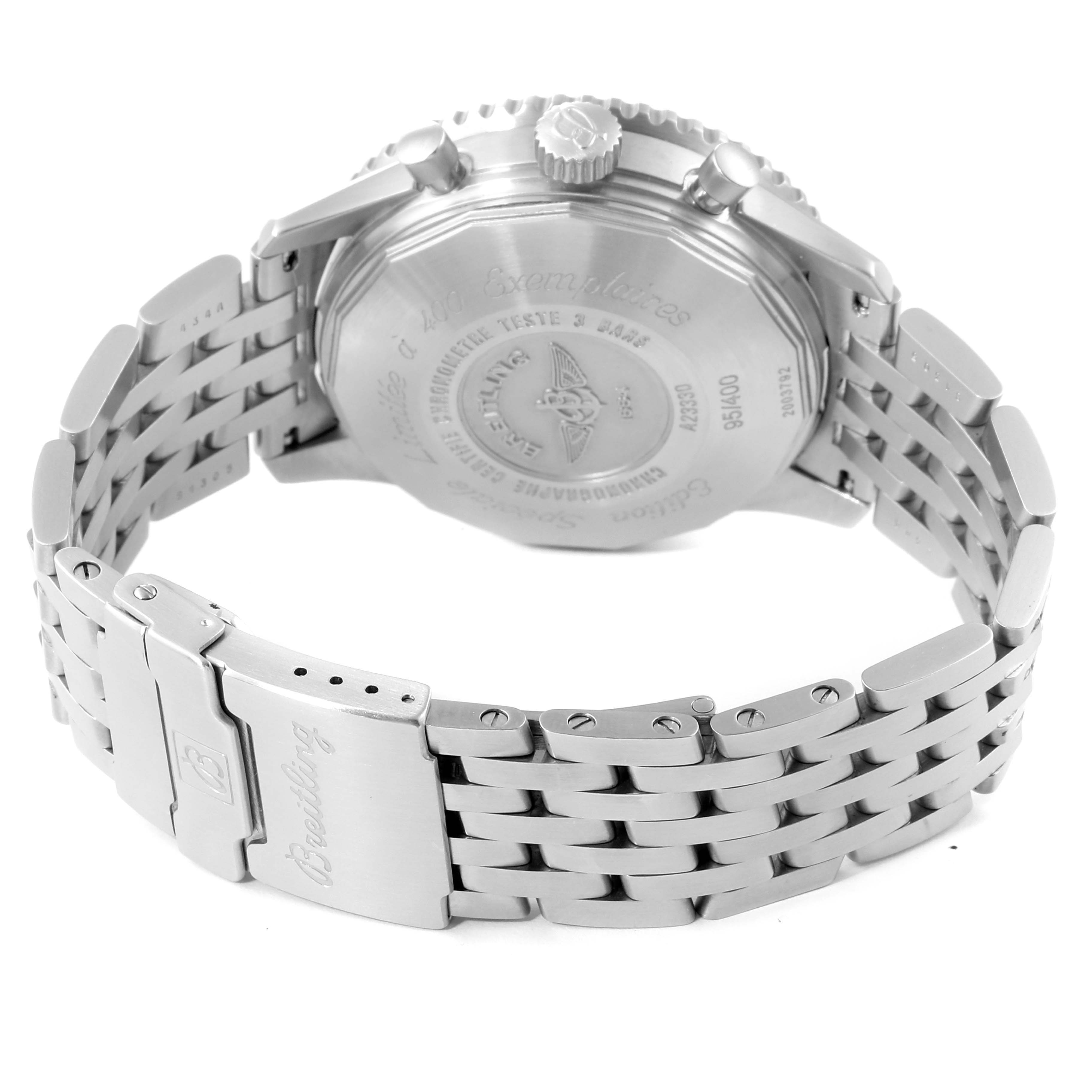 The image shows the back case and metal bracelet of a Breitling Navitimer A23330 Men's Stainless Steel Silver Dial A23330 Men's Stainless Steel Silver Dial watch at an angled rear view.