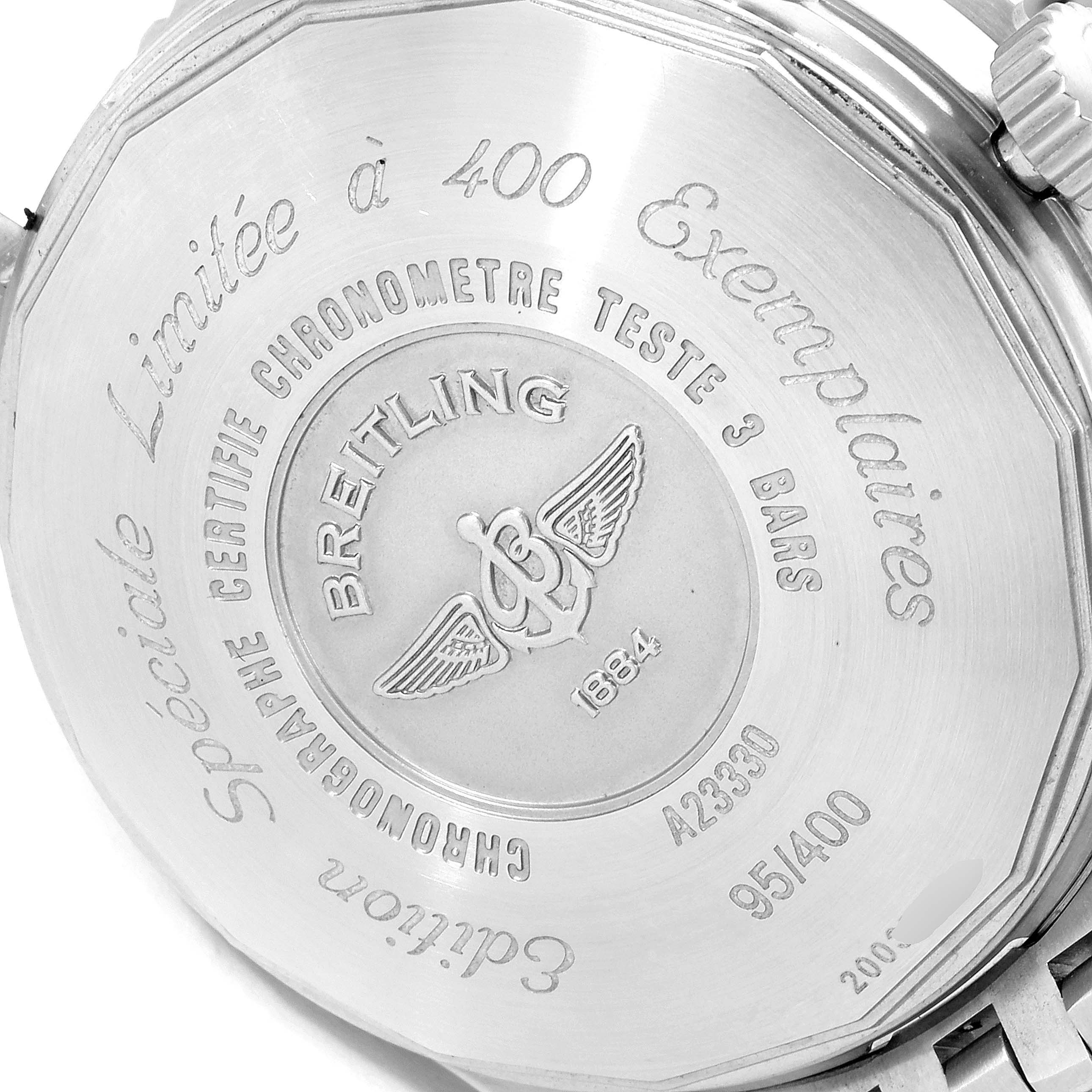 The image shows the case back of a Breitling Navitimer A23330 Men's Stainless Steel Silver Dial A23330 Men's Stainless Steel Silver Dial watch, engraved with model details and serial number.