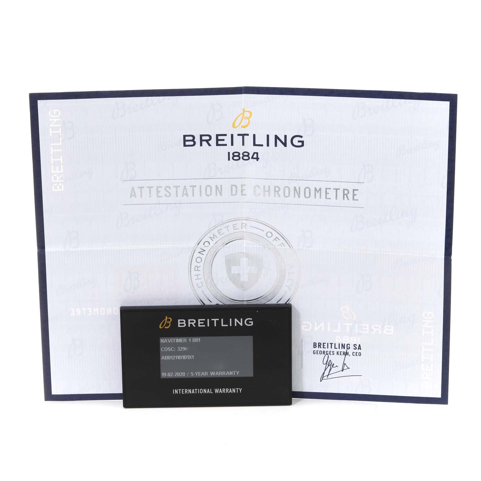 The image shows a Breitling Navitimer AB0121 Men's Stainless Steel Black Dial AB0121 Men's Stainless Steel Black Dial model's warranty card and certificate from a front angle.