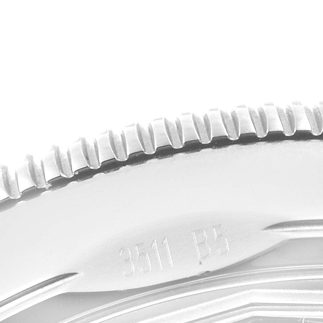 This is a close-up angle showing the bezel portion of a Breitling Superocean A17321 Men
s Stainless Steel Blue Dial A17321 Men
s Stainless Steel Blue Dial watch.