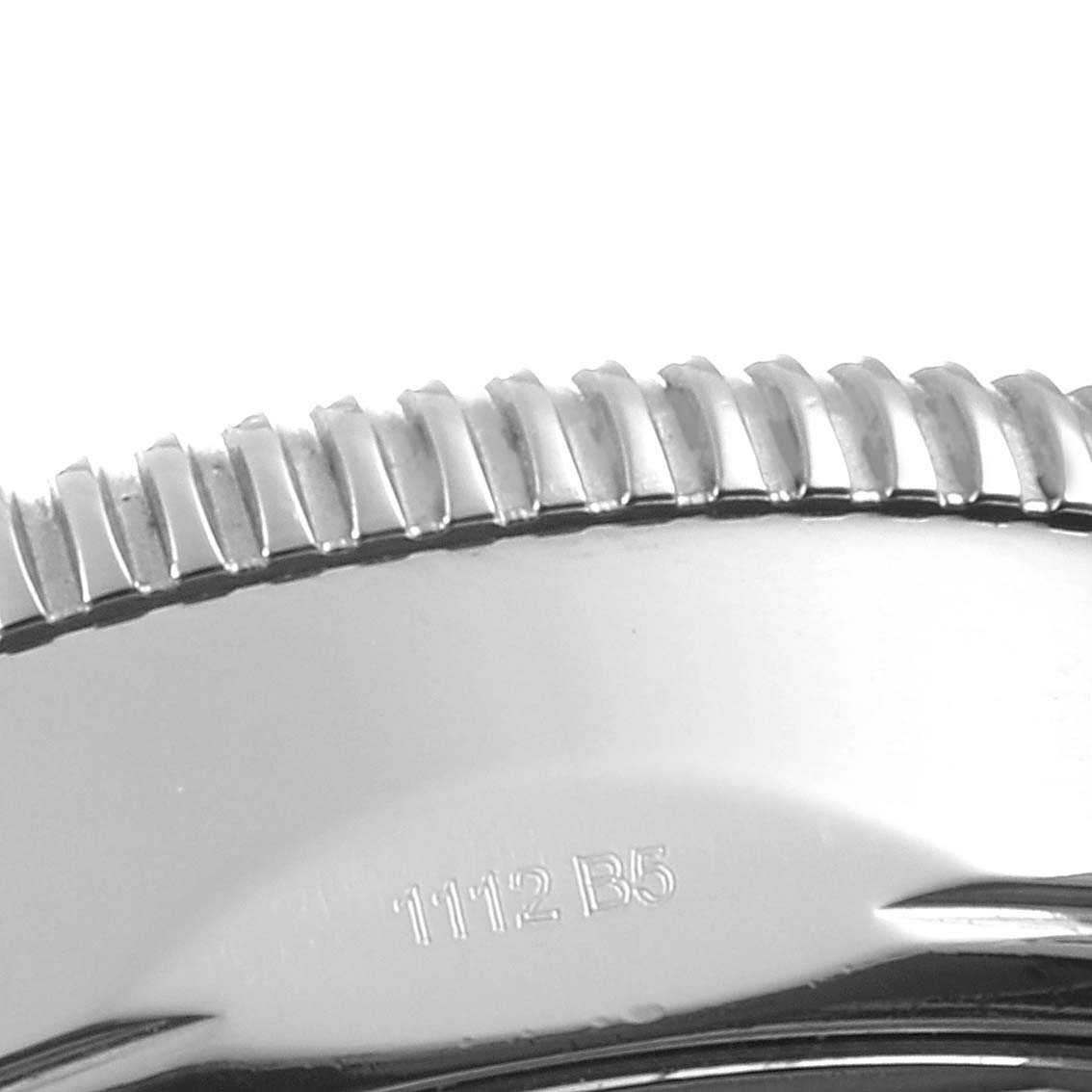 The image shows a close-up angle of the side of the bezel and case back of a Breitling Superocean A23370 Men's Stainless Steel Blue Dial A23370 Men's Stainless Steel Blue Dial watch.