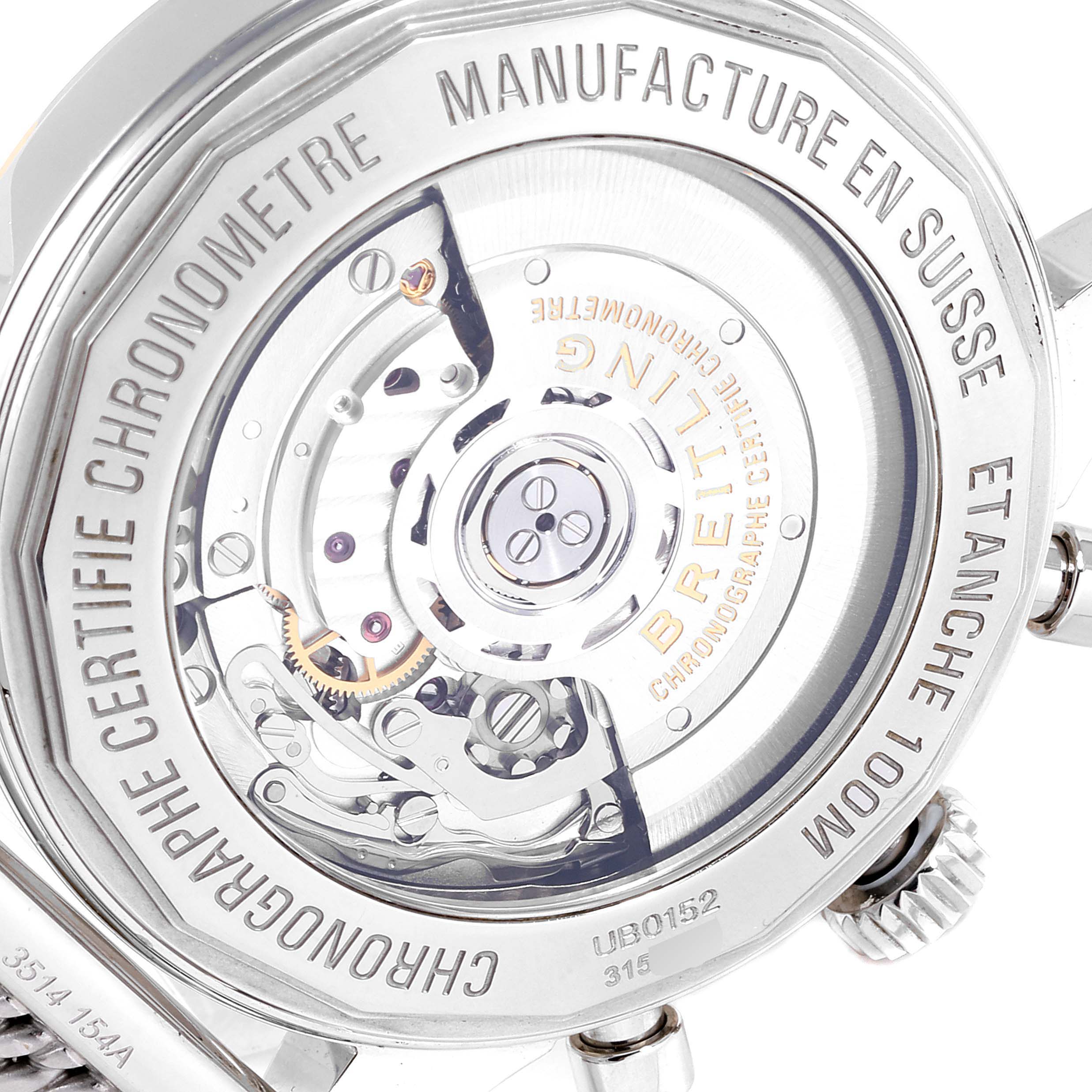 The image shows the back case of the Breitling Transocean UB015212/BC74-SS Men's Steel and Gold (two tone) Black Dial UB015212/BC74-SS Men's Steel and Gold (two tone) Black Dial watch, revealing its internal mechanical movement.