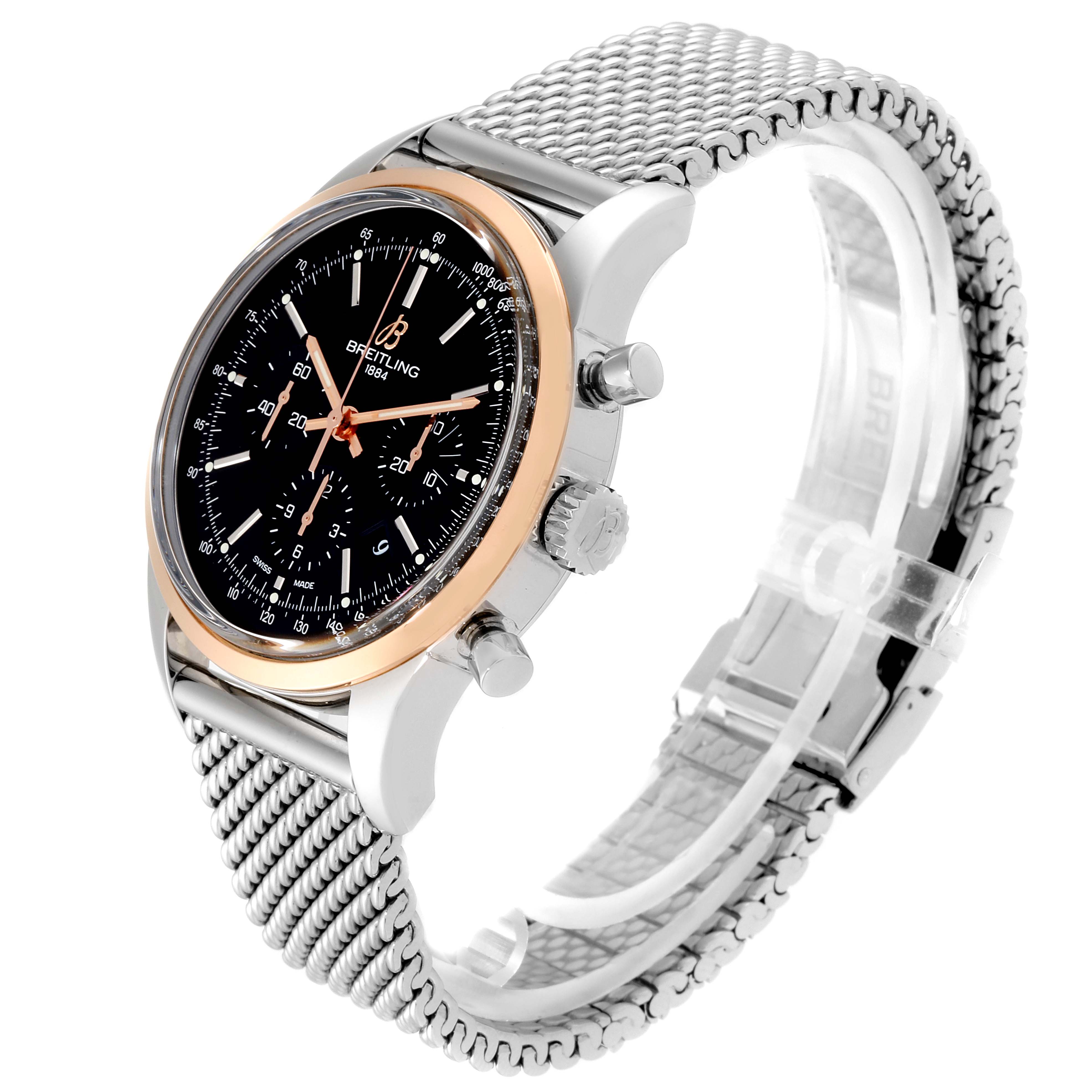 The Breitling Transocean UB015212/BC74-SS Men's Steel and Gold (two tone) Black Dial UB015212/BC74-SS Men's Steel and Gold (two tone) Black Dial watch is shown at a right-side angle, featuring the dial, case, pushers, and mesh bracelet.