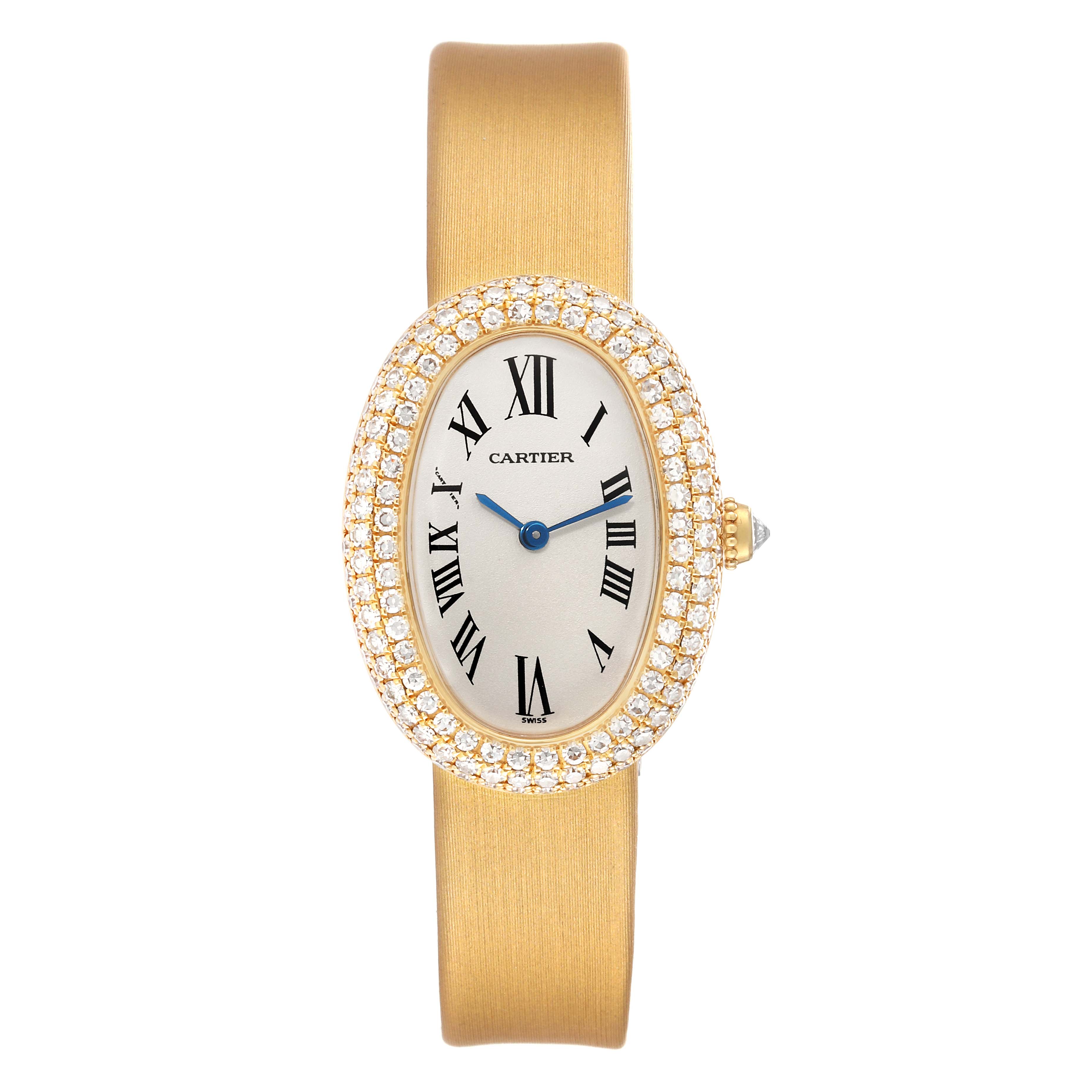 The image shows a front view of a Cartier Baignoire 1954 Women's Yellow Gold Silver Dial 1954 Women's Yellow Gold Silver Dial watch featuring a gold band and a diamond-encrusted oval bezel.