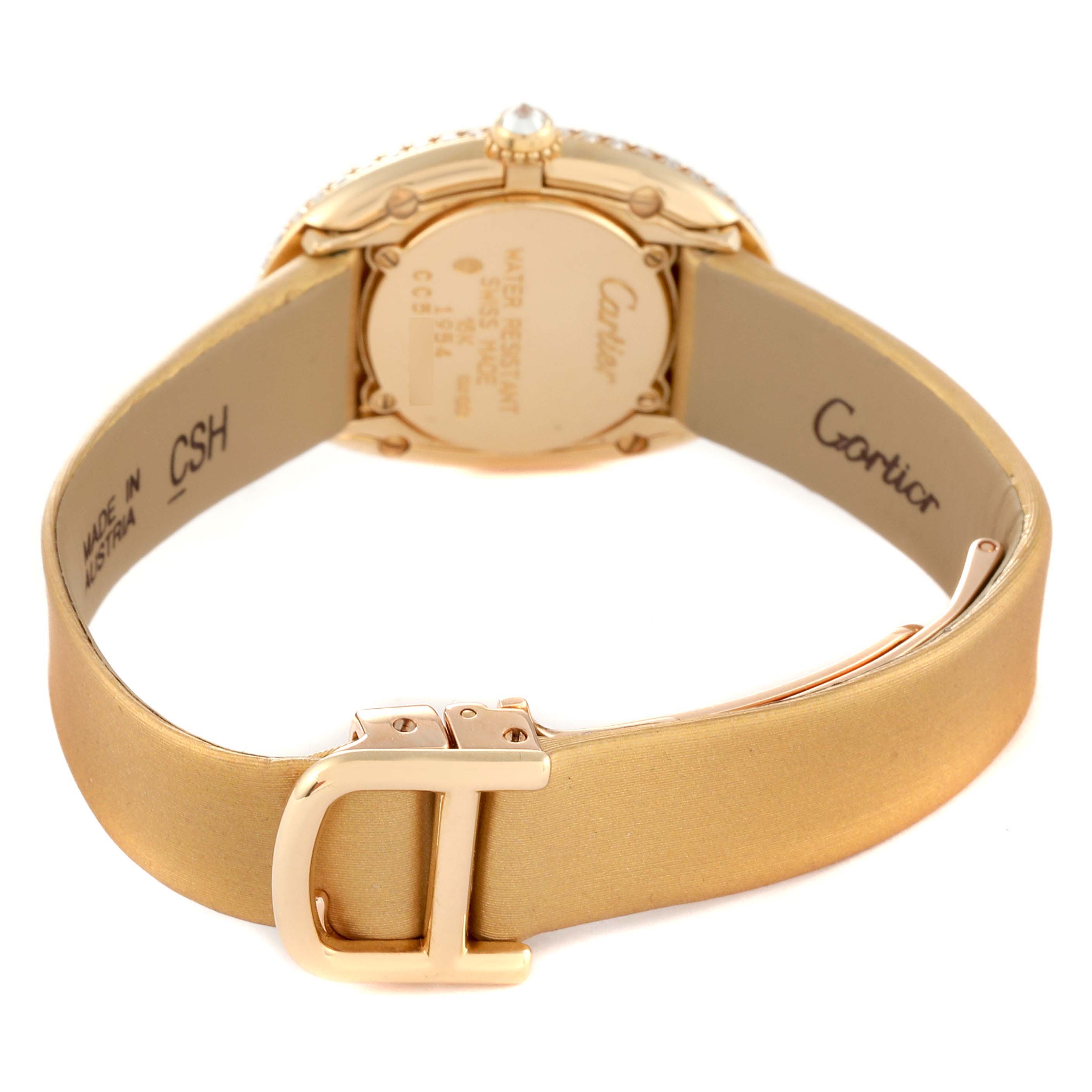 The image shows the back and strap of a Cartier Baignoire 1954 Women's Yellow Gold Silver Dial 1954 Women's Yellow Gold Silver Dial watch, highlighting the buckle and case back details.
