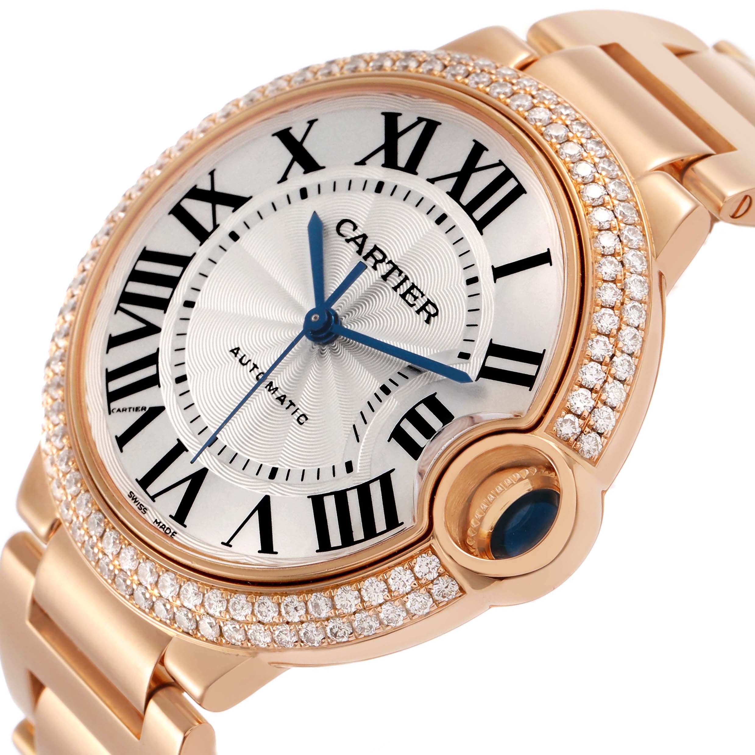 The Cartier Ballon Bleu WE9005Z3 Women's Rose Gold Silver Dial watch is shown at a slight angle, highlighting the diamond-encrusted bezel and the blue cabochon crown.