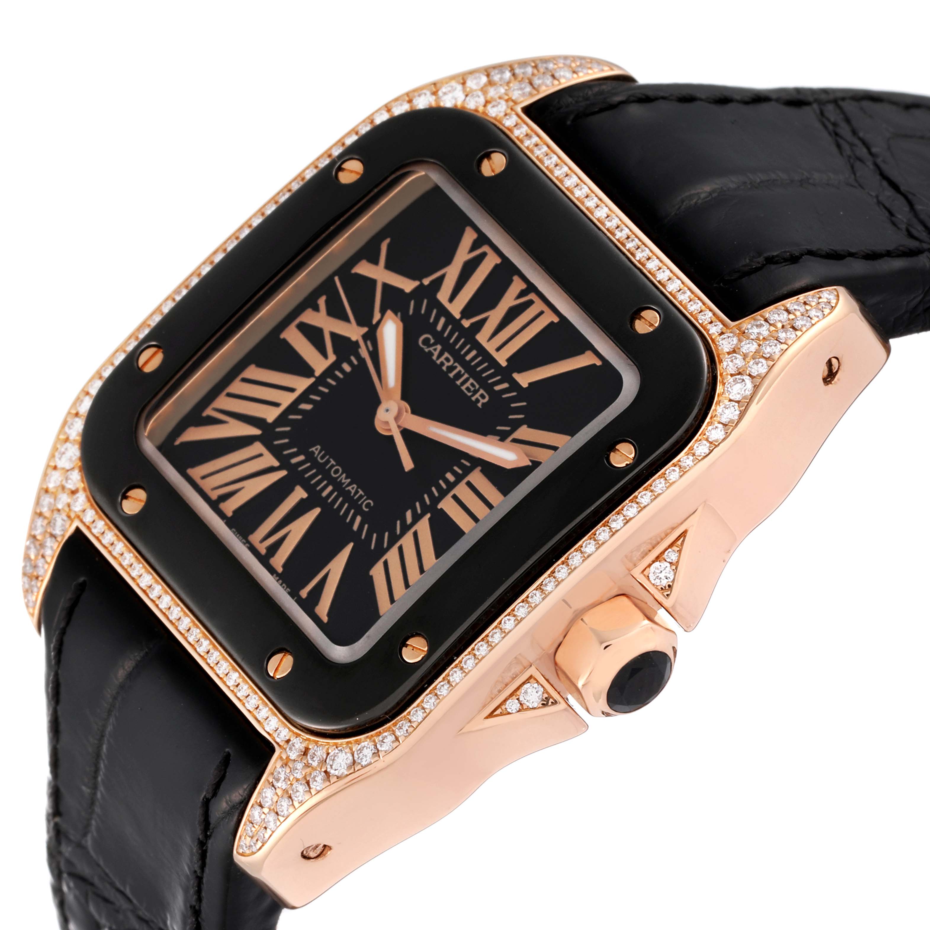 The Cartier Santos WM505017 Men's Rose Gold Black Dial WM505017 Men's Rose Gold Black Dial watch is shown at an angle highlighting the face, bezel, crown, and part of the strap.