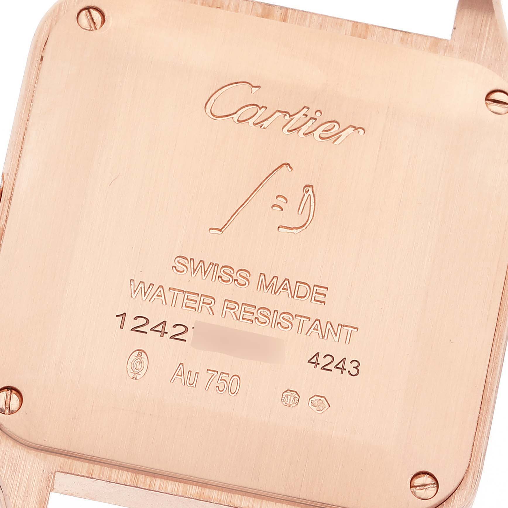 The image shows the back casing of a Cartier Santos WJSA0017 Women
s Rose Gold Silver Dial WJSA0017 Women
s Rose Gold Silver Dial Dumont watch, etched with brand markings and specifications.