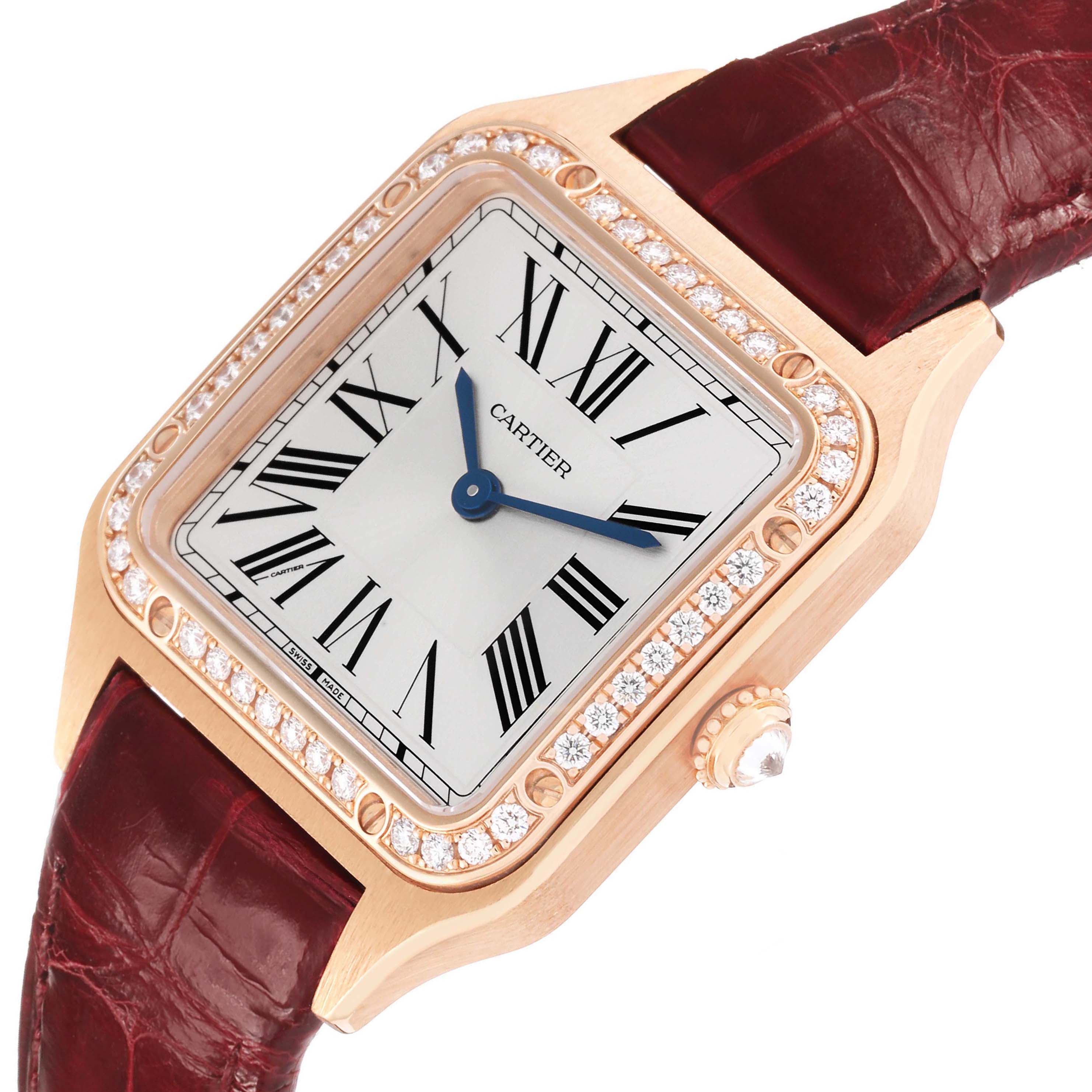 The Cartier Santos WJSA0017 Women's Rose Gold Silver Dial watch is shown from an angled top view, highlighting the face, crown, and leather strap.