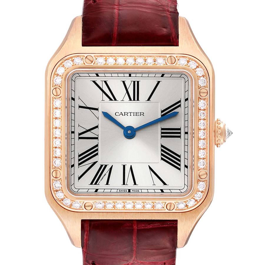 The Cartier Santos WJSA0017 Women's Rose Gold Silver Dial watch is shown from a frontal angle, highlighting its square face, diamond bezel, Roman numerals, and red leather strap.