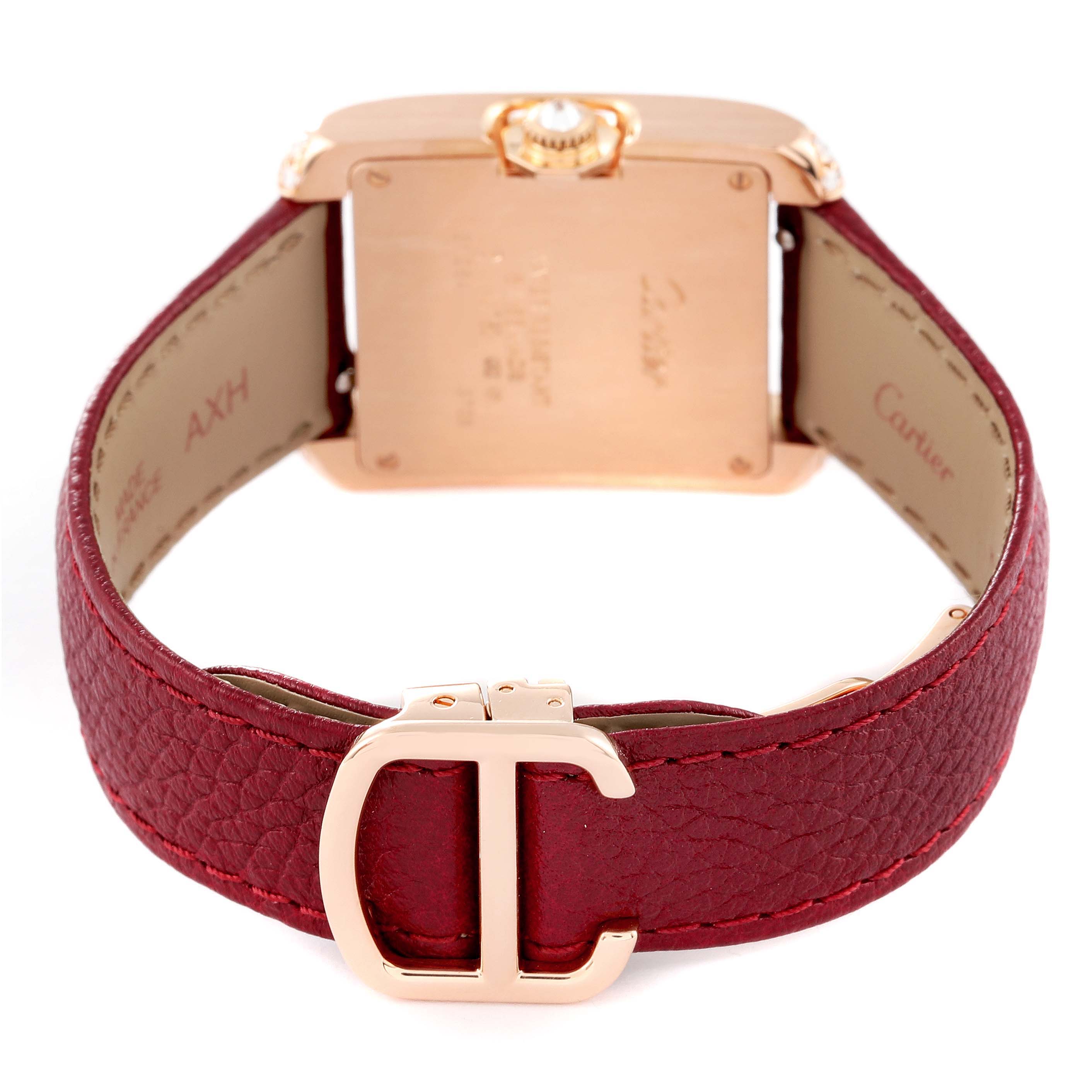 The photo shows the back view of the Cartier Tank Anglaise WT100029 Women
s Rose Gold Silver Dial WT100029 Women
s Rose Gold Silver Dial watch, highlighting the red leather strap and clasp.
