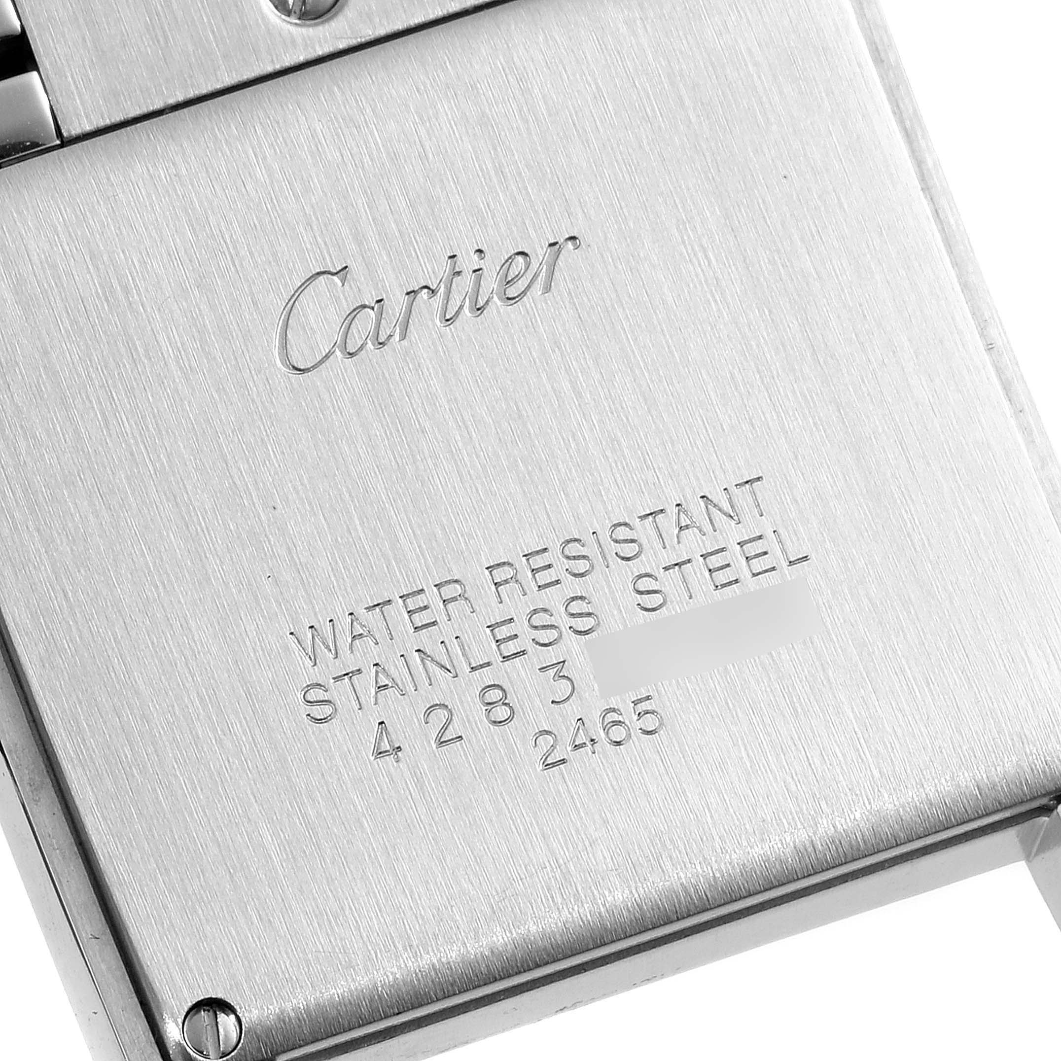 The image shows the back case of a Cartier Tank Francaise W51012Q4 Women's Steel and Gold (two tone) Silver Dial W51012Q4 Women's Steel and Gold (two tone) Silver Dial watch engraved with brand and model details.
