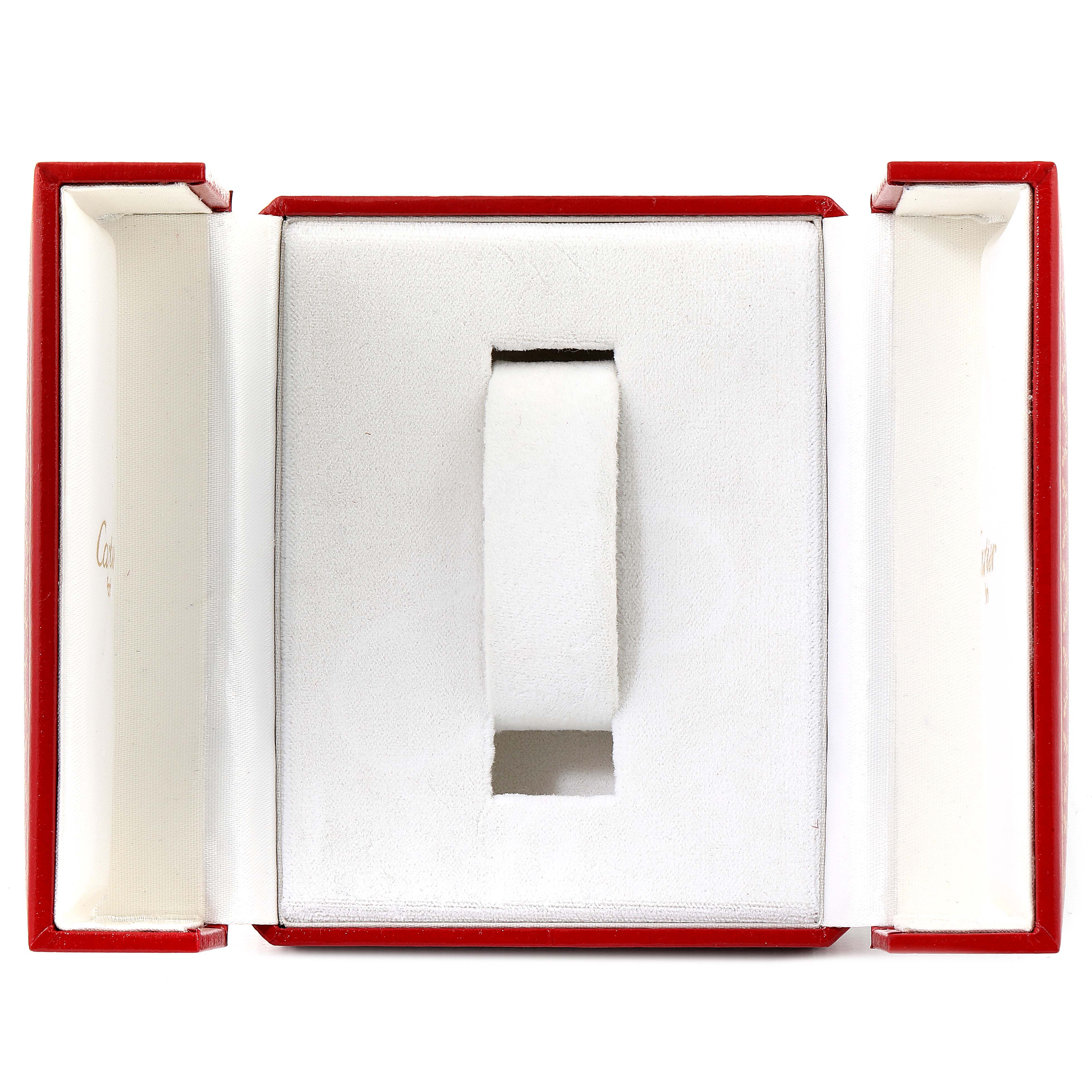 This is an image of an open Cartier Tank Francaise W51012Q4 Women's Steel and Gold (two tone) Silver Dial W51012Q4 Women's Steel and Gold (two tone) Silver Dial watch box, displaying the watch holder inside.