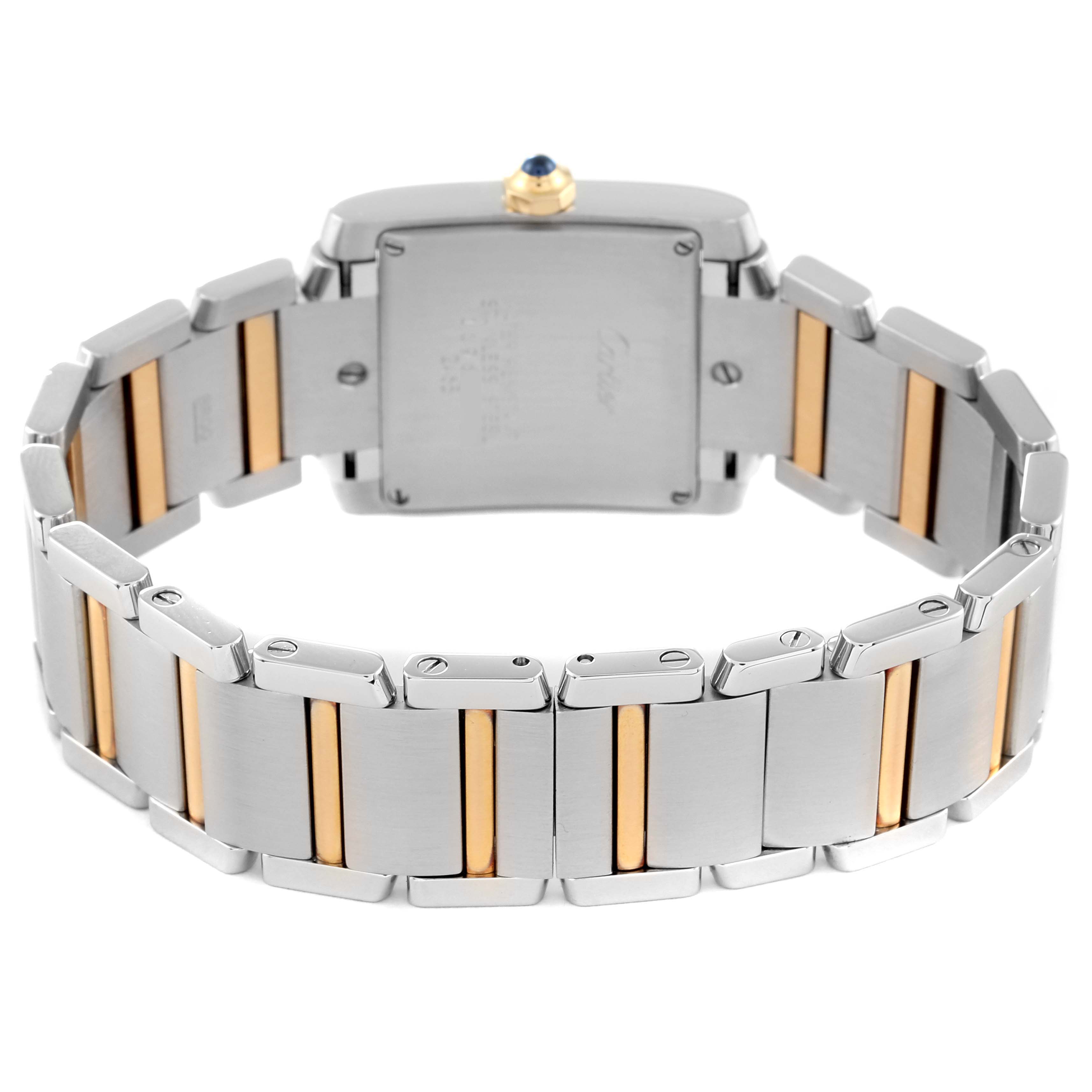 The Cartier Tank Francaise W51012Q4 Women
s Steel and Gold (two tone) Silver Dial W51012Q4 Women
s Steel and Gold (two tone) Silver Dial watch is shown from the caseback and bracelet angle showcasing its two-tone metal design.
