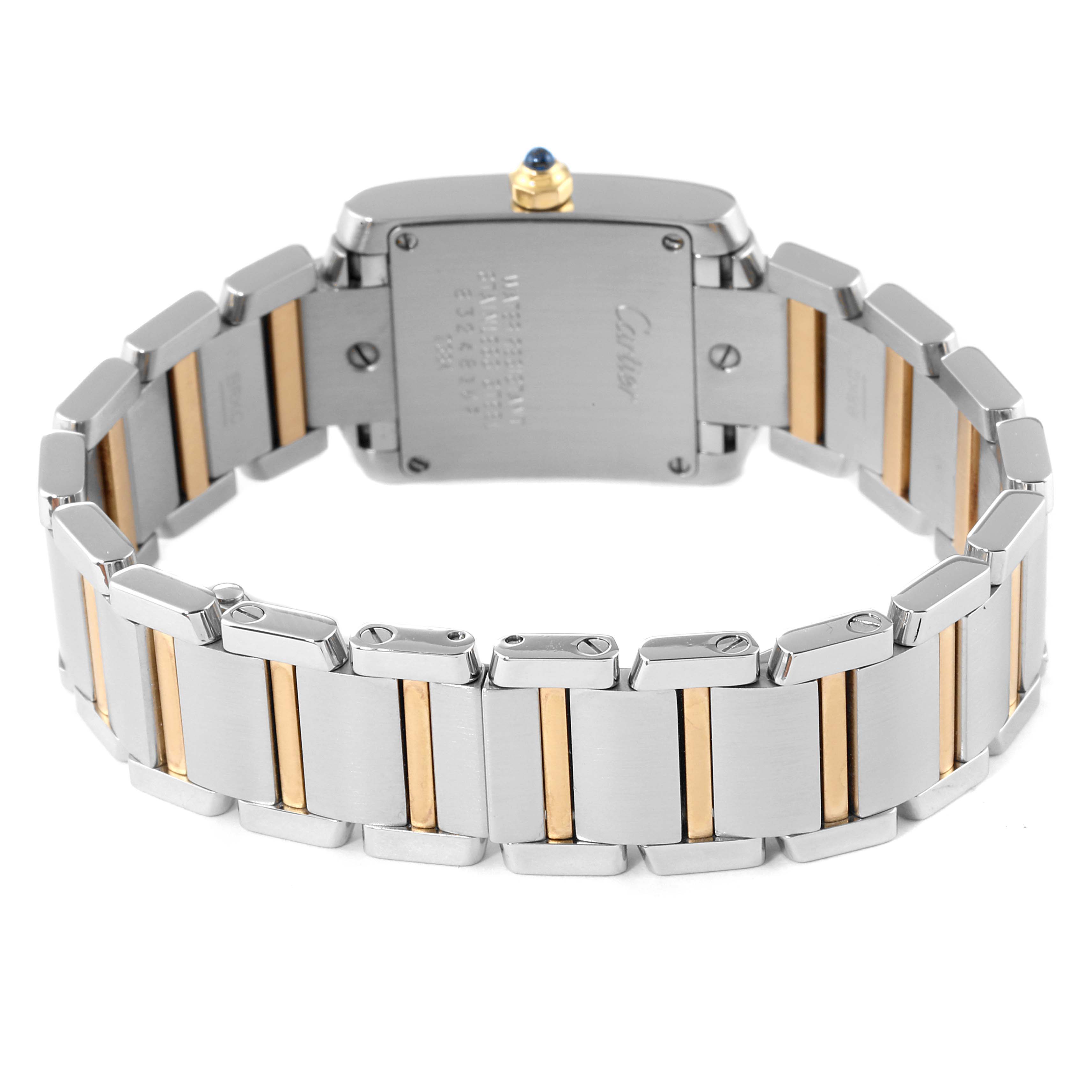 The image shows the back view of the Tank Francaise watch by Cartier, highlighting the stainless steel and gold bracelet.