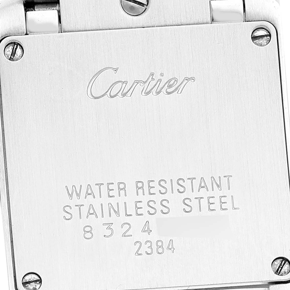 The image shows the back of a Cartier Tank Francaise W51007Q4 Women's Steel and Gold (two tone) Silver Dial W51007Q4 Women's Steel and Gold (two tone) Silver Dial watch highlighting the case with the brand engraving and water-resistant details.