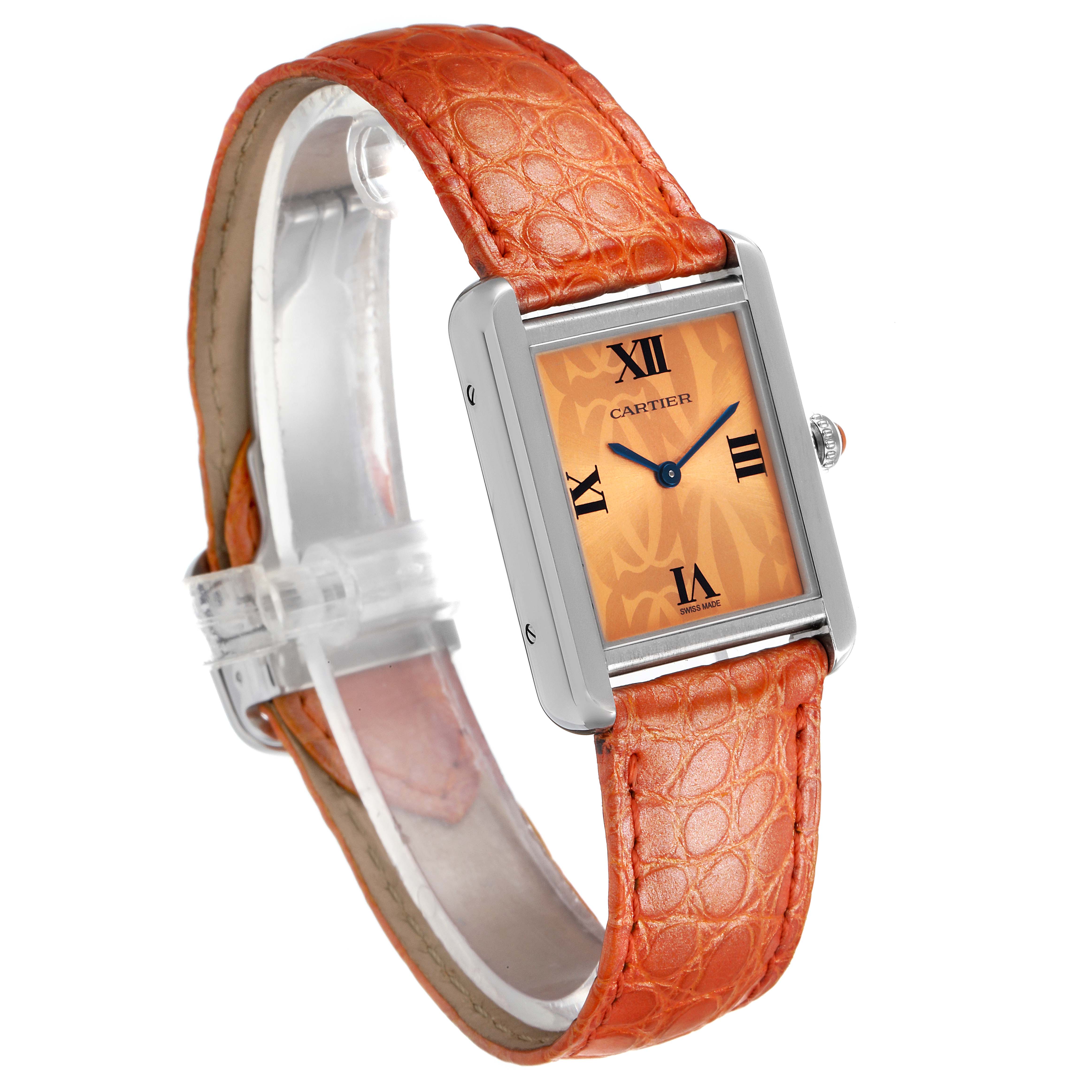 The angle shows a Cartier Tank Solo W1019455 Women's Stainless Steel Orange Dial W1019455 Women's Stainless Steel Orange Dial watch with an orange leather strap, face, and silver rectangular case.