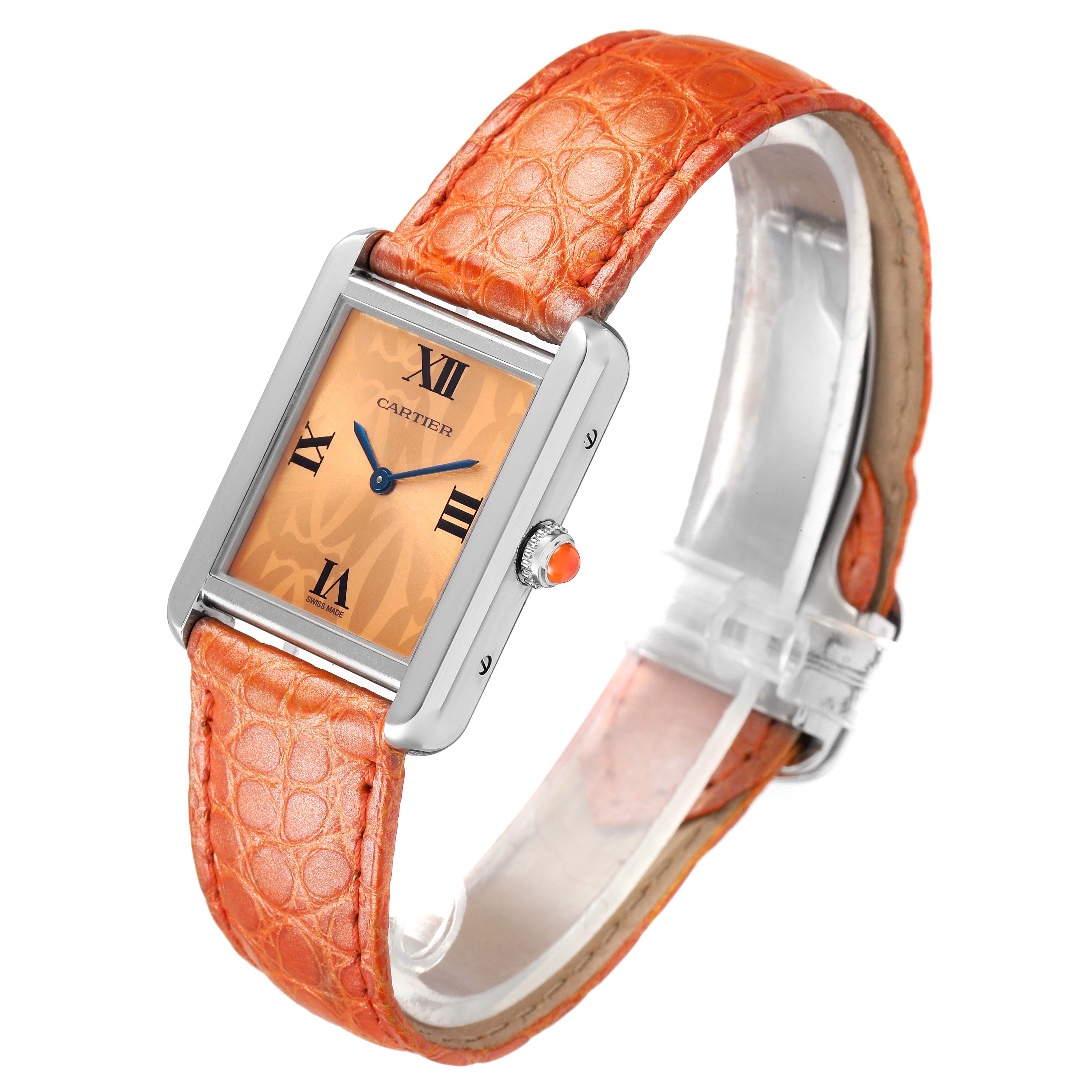 The Cartier Tank Solo W1019455 Women's Stainless Steel Orange Dial W1019455 Women's Stainless Steel Orange Dial watch is shown from a slight angled perspective, featuring its orange leather strap and rectangular dial.