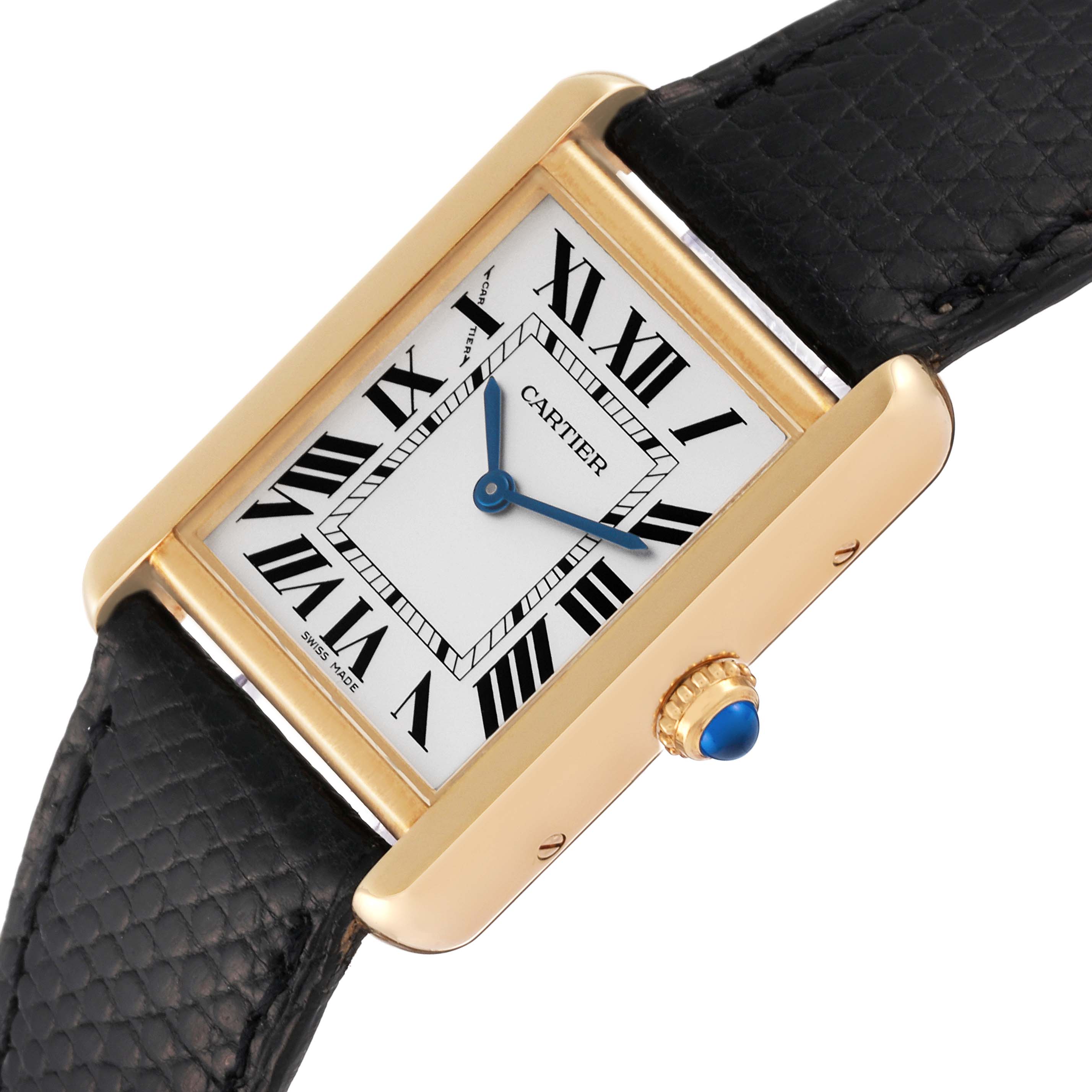 This image shows a Cartier Tank Solo W5200002 Men
s Yellow Gold Silver Dial W5200002 Men
s Yellow Gold Silver Dial watch at an angled top-down view, highlighting the face, bezel, and part of the wristband.
