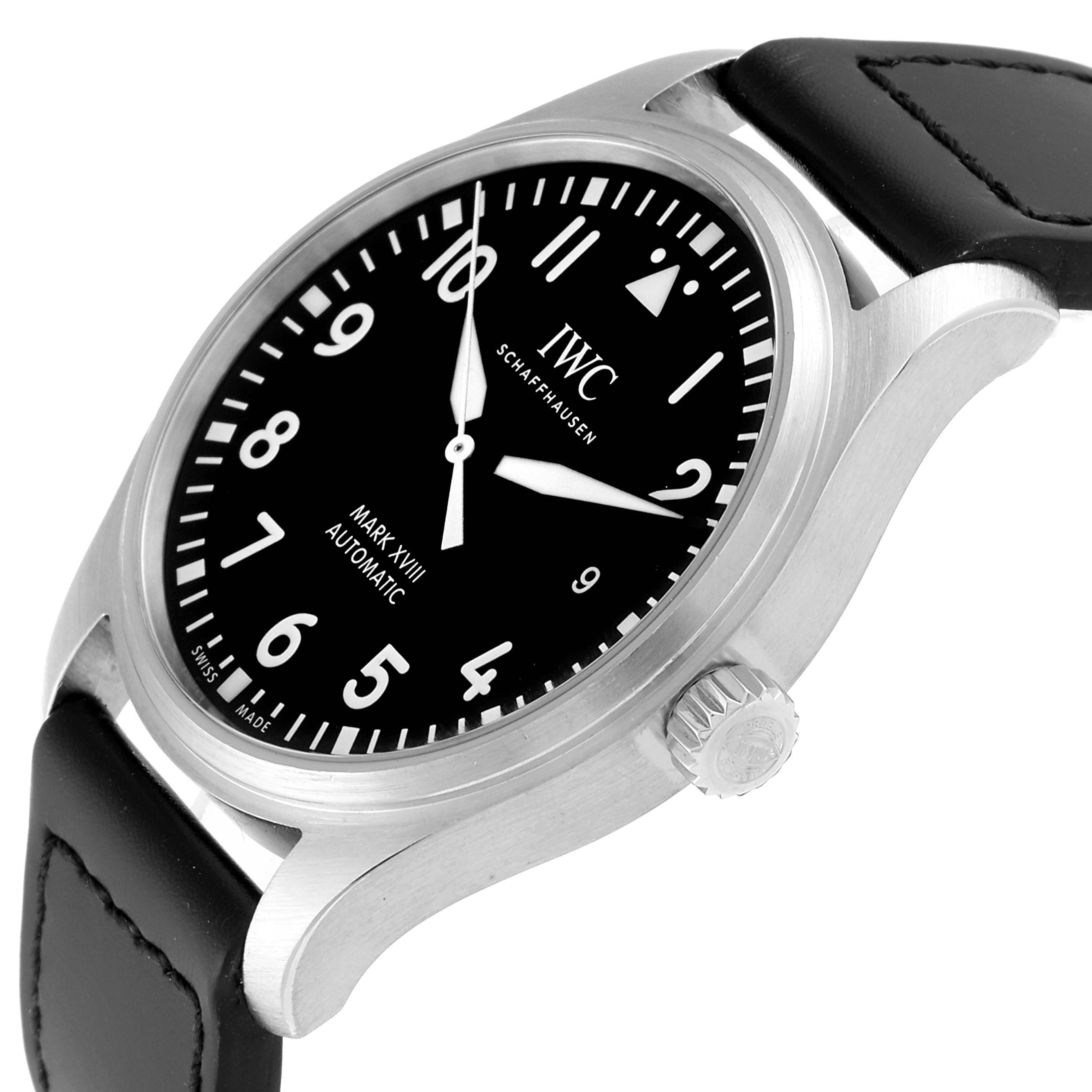 The Pilot model by IWC is shown from a slightly angled side view, displaying the watch face, crown, and leather strap.