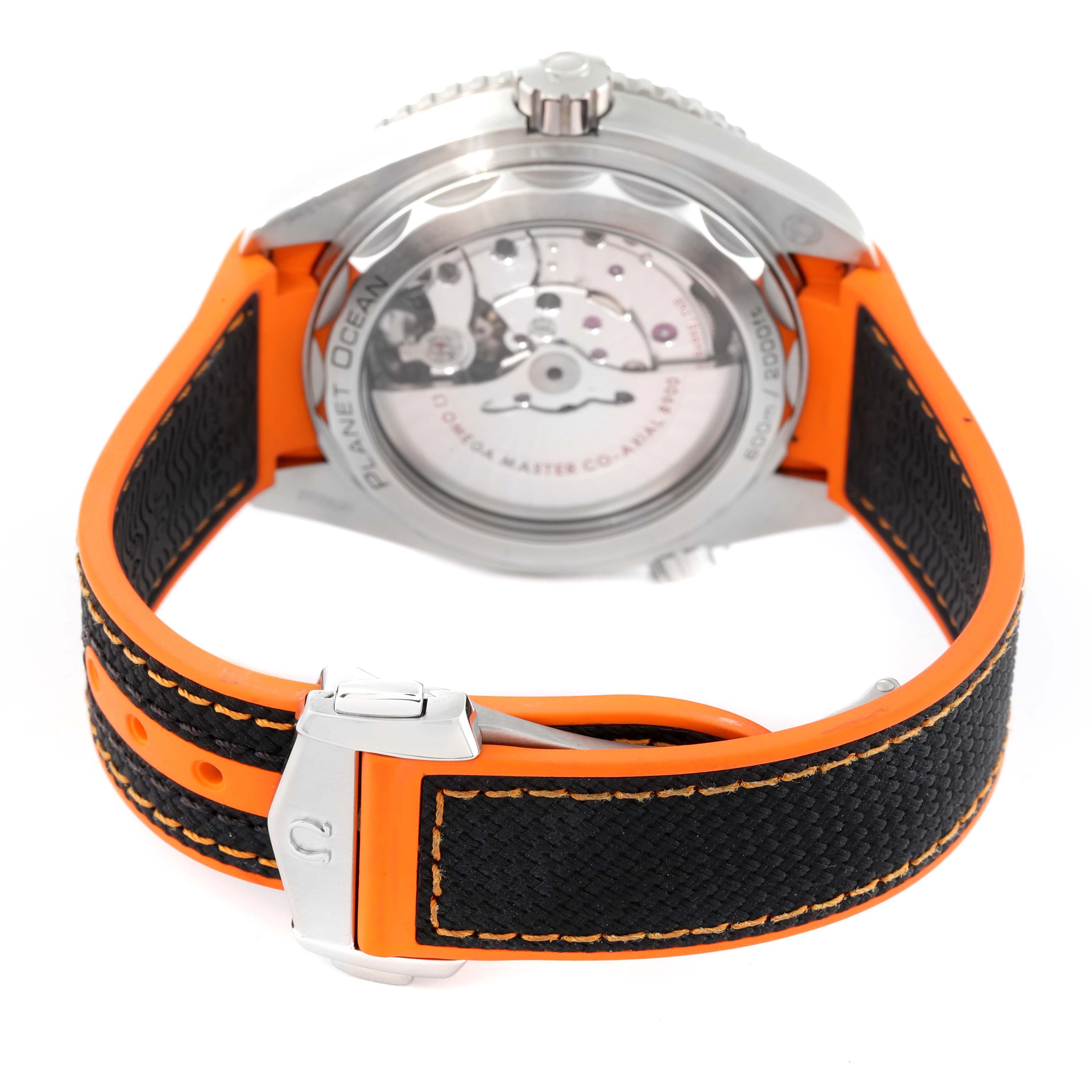 This image shows the back view of the Omega Planet Ocean 215.32.44.21.01.001 Men's Stainless Steel Black Dial 215.32.44.21.01.001 Men's Stainless Steel Black Dial watch, highlighting the case back and part of the orange-black strap.