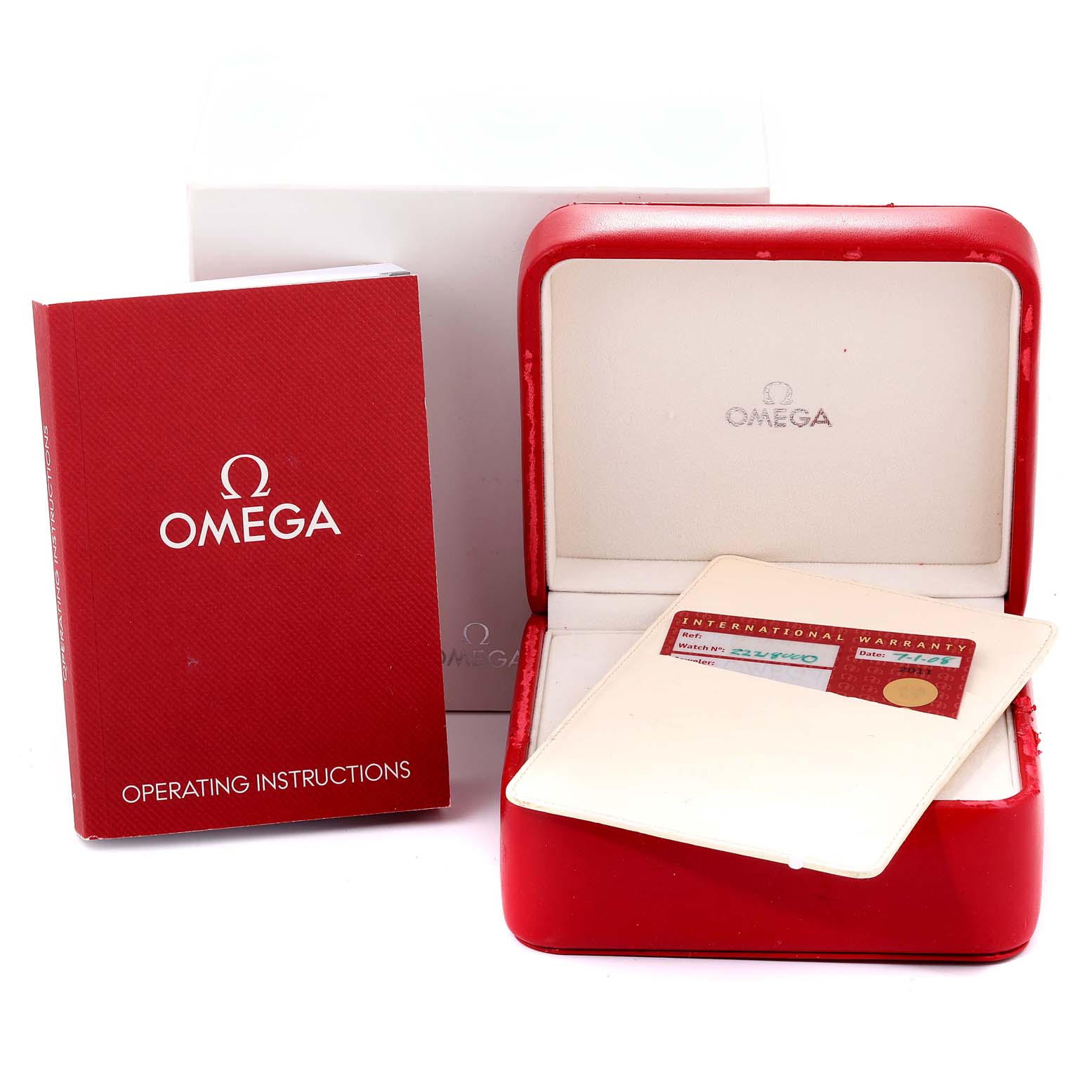 The image shows an Omega Seamaster 2221.80.00 Men's Stainless Steel Blue Dial 2221.80.00 Men's Stainless Steel Blue Dial model's red watch box, operating instructions booklet, and international warranty card.