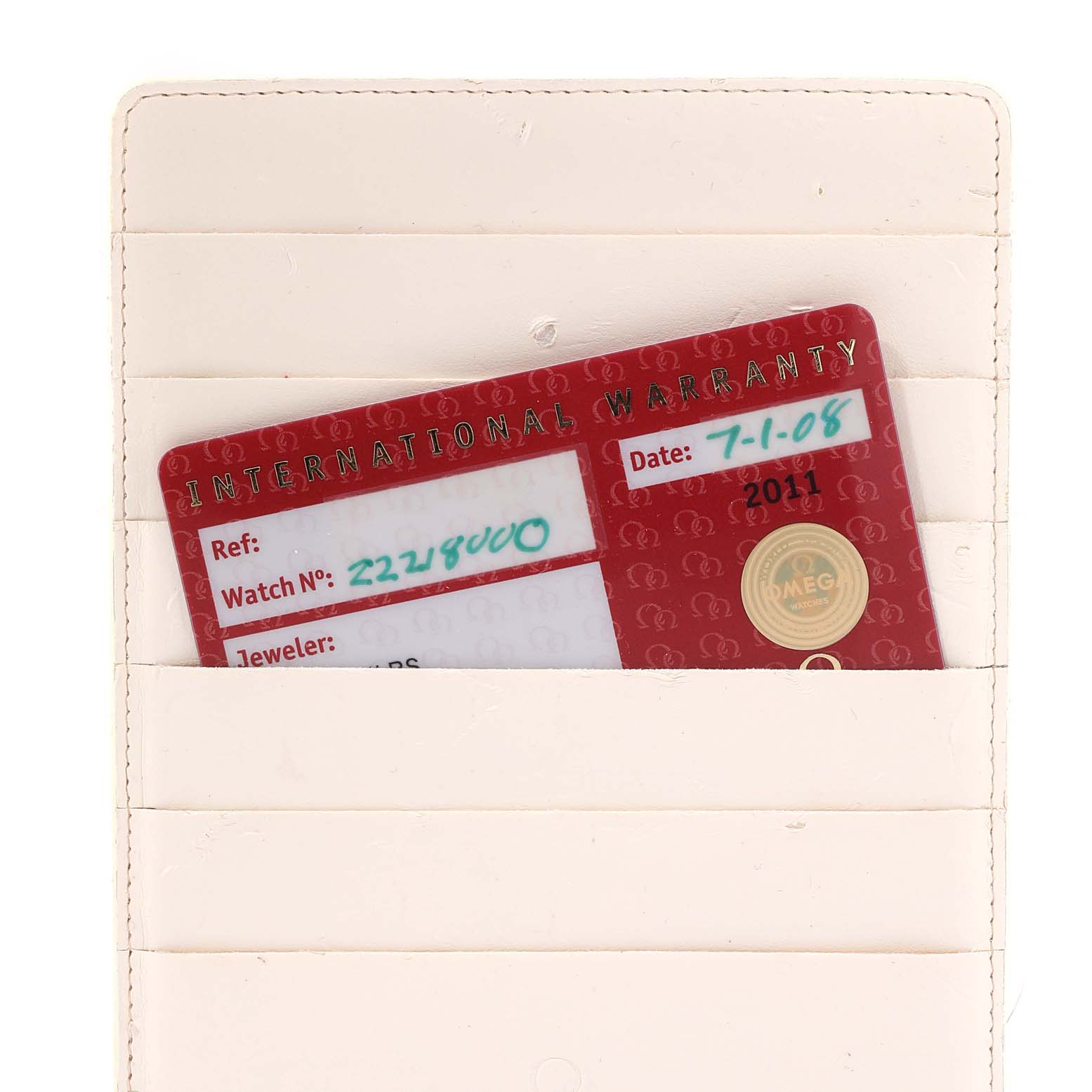 The image shows an Omega Seamaster 2221.80.00 Men's Stainless Steel Blue Dial 2221.80.00 Men's Stainless Steel Blue Dial International Warranty card in a white cardholder.