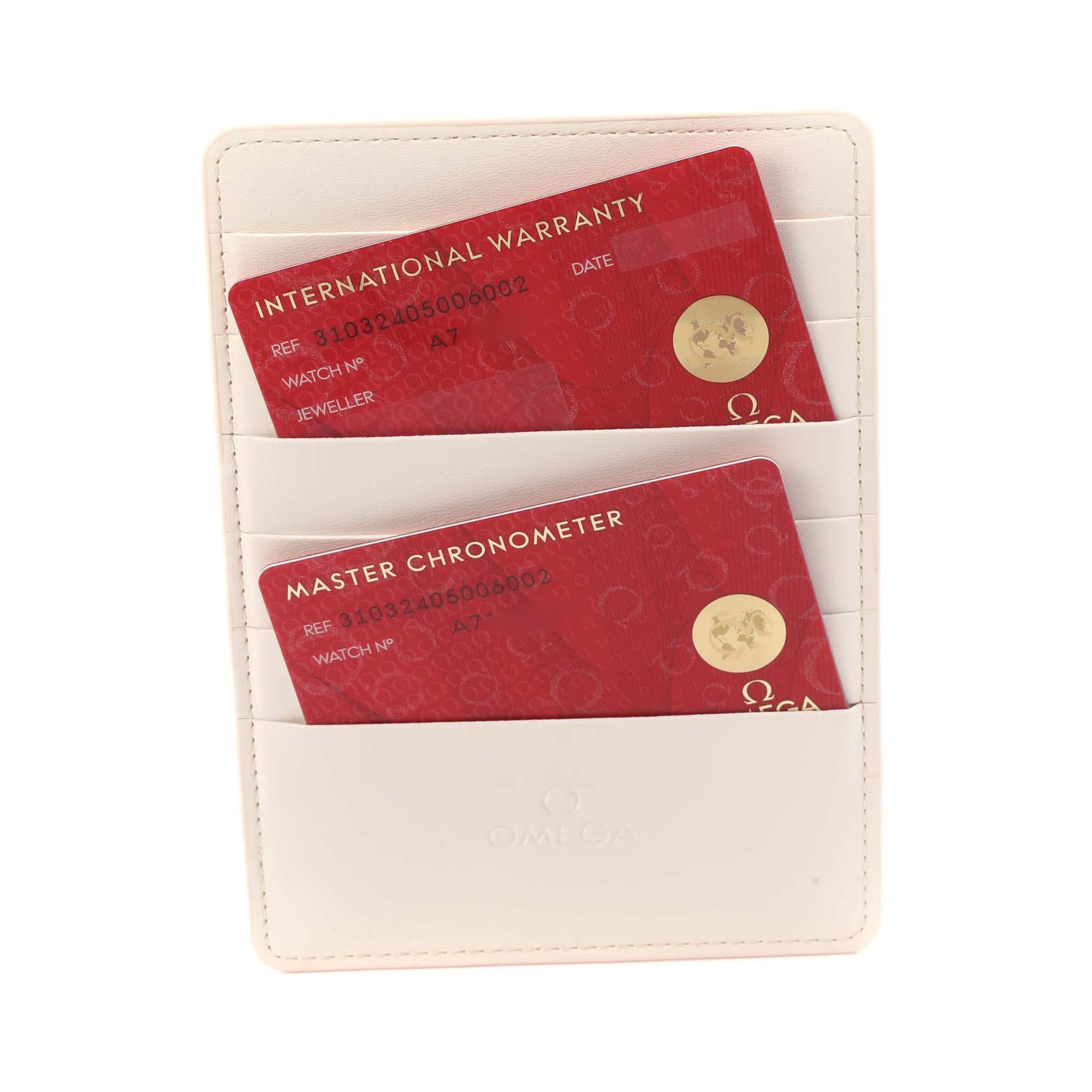 The image shows warranty cards for an Omega Speedmaster, model 310.32.40.50.06.002, housed in a white cardholder.