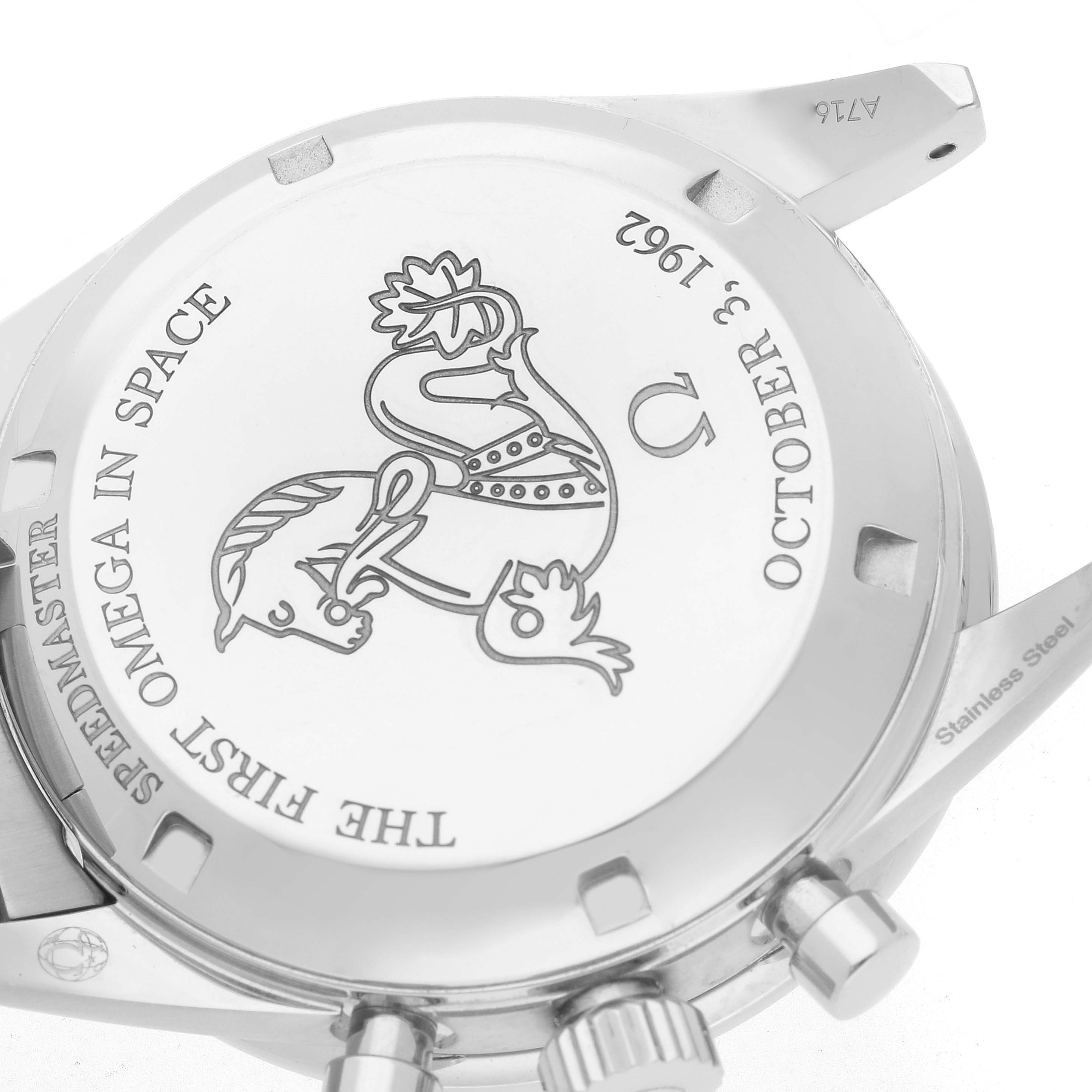 The image shows the case back of the Omega Speedmaster model 310.32.40.50.06.002, featuring engraved text and a design, along with the watch
s lugs and pushers.