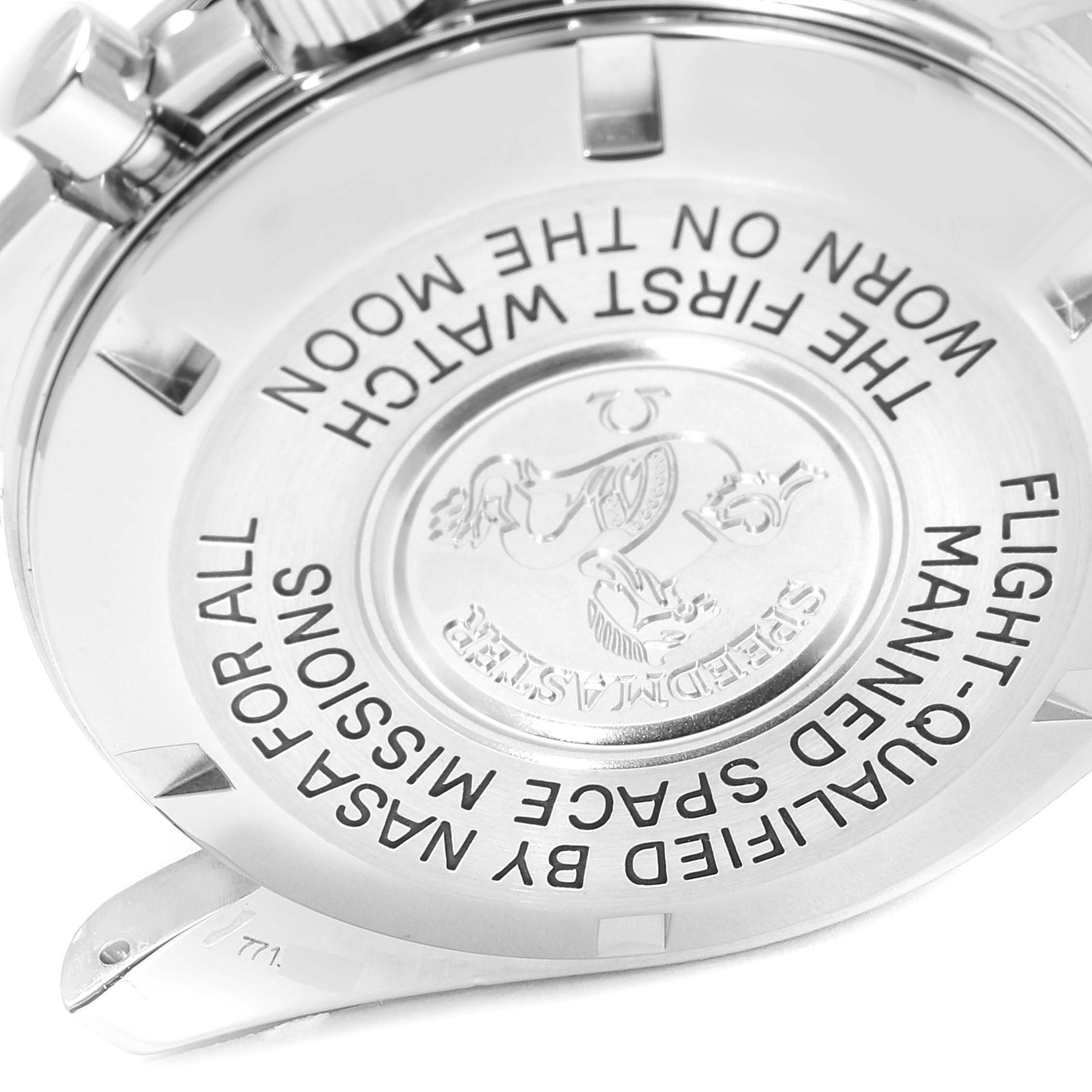 This image shows the engraved case back of an Omega Speedmaster 3570.50.00 Men's Stainless Steel Black Dial 3570.50.00 Men's Stainless Steel Black Dial watch at an angled close-up view.