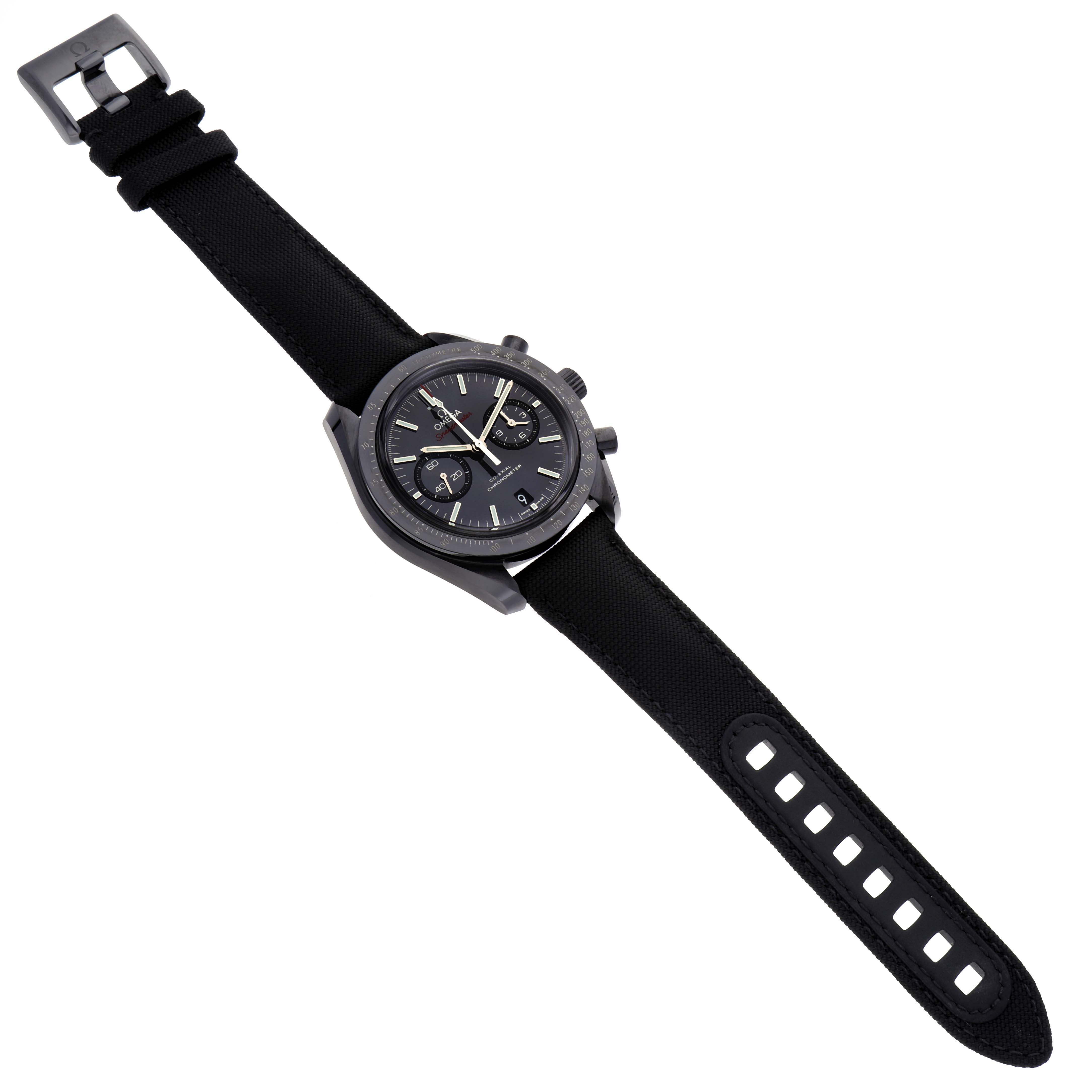 The Omega Speedmaster 311.92.44.51.01.003 Men's Ceramic Black Dial 311.92.44.51.01.003 Men's Ceramic Black Dial watch is shown in a top-down angle, displaying its face, case, and strap.