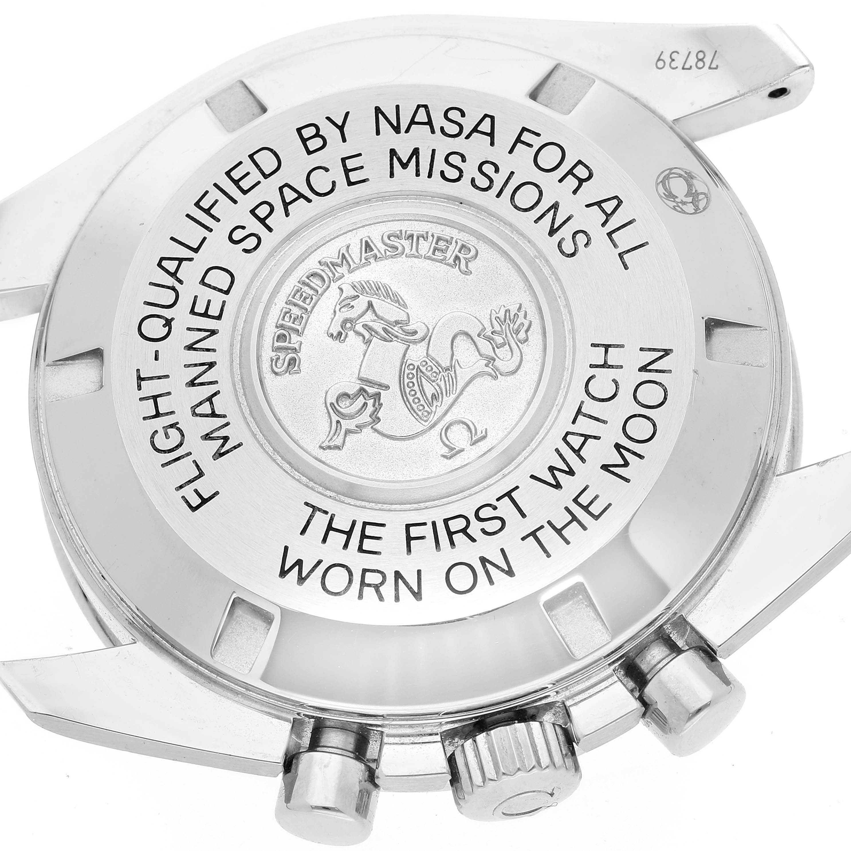 The image shows the case back of an Omega Speedmaster 311.30.42.30.01.005 Men's Stainless Steel Black Dial 311.30.42.30.01.005 Men's Stainless Steel Black Dial watch, featuring the engraving and crown.