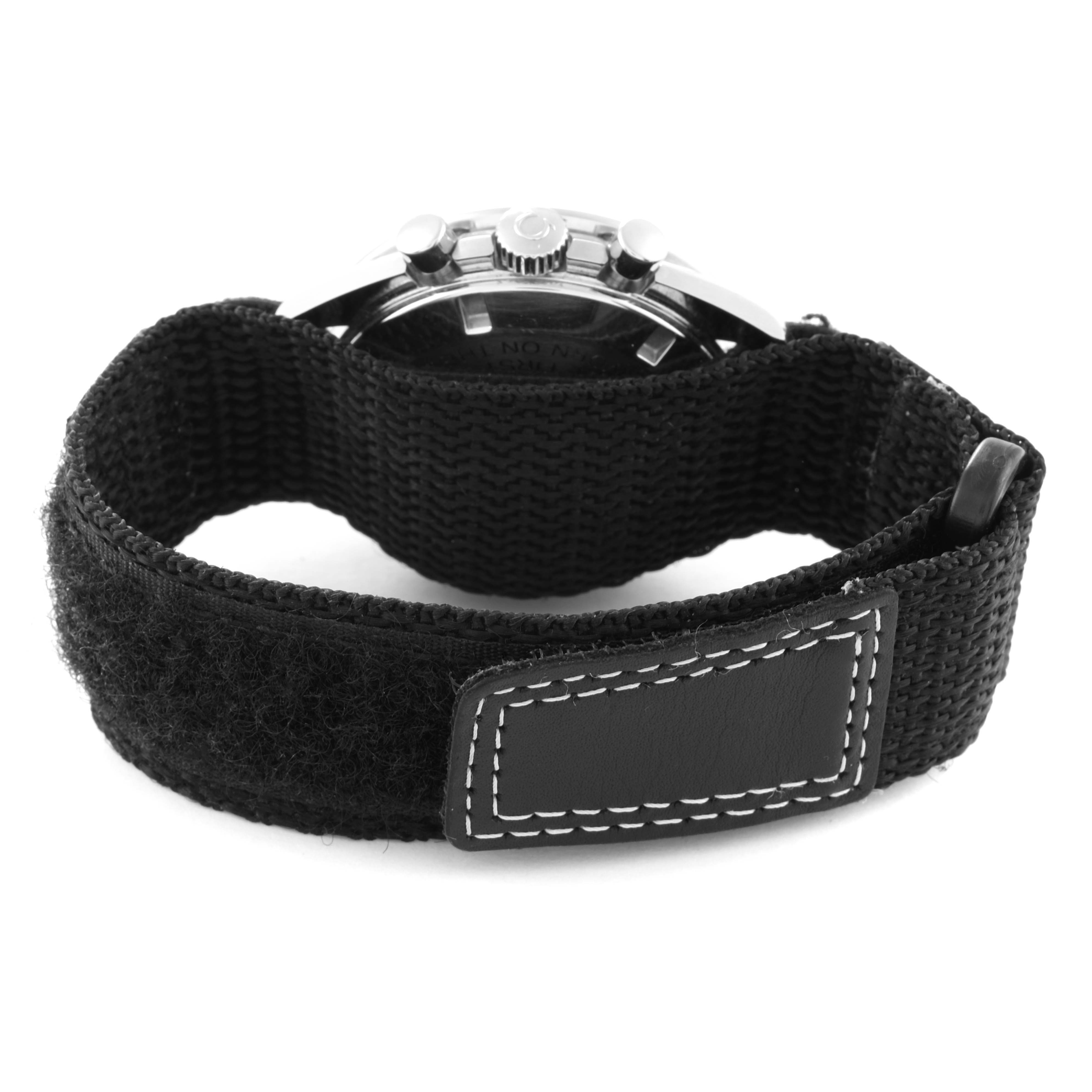 The image shows the back of an Omega Speedmaster 311.30.42.30.01.005 Men's Stainless Steel Black Dial 311.30.42.30.01.005 Men's Stainless Steel Black Dial watch with a black fabric strap and visible stitching.