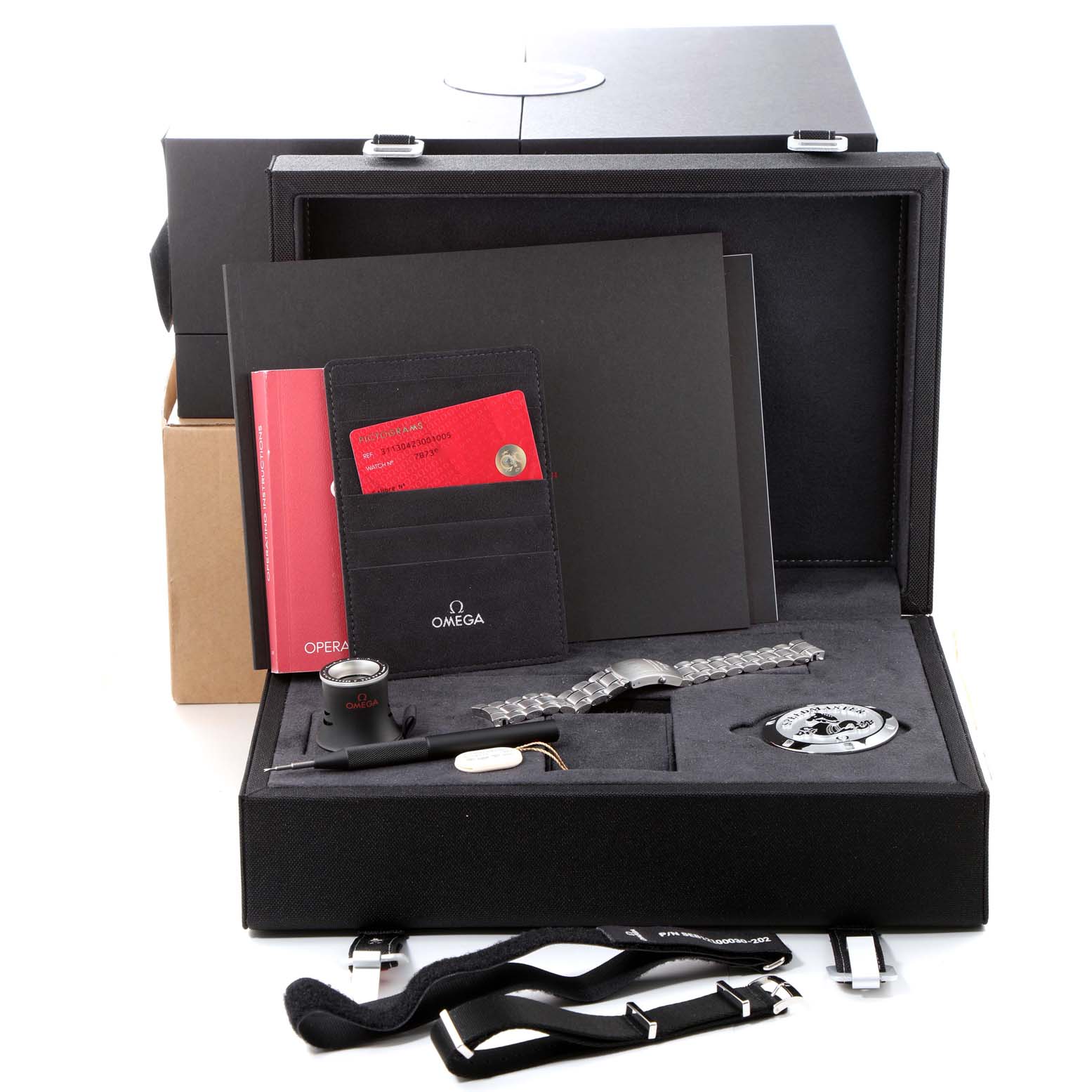 The image shows an Omega Speedmaster 311.30.42.30.01.005 Men's Stainless Steel Black Dial 311.30.42.30.01.005 Men's Stainless Steel Black Dial watch box, including the watch, straps, manuals, cardholder, and other accessories.