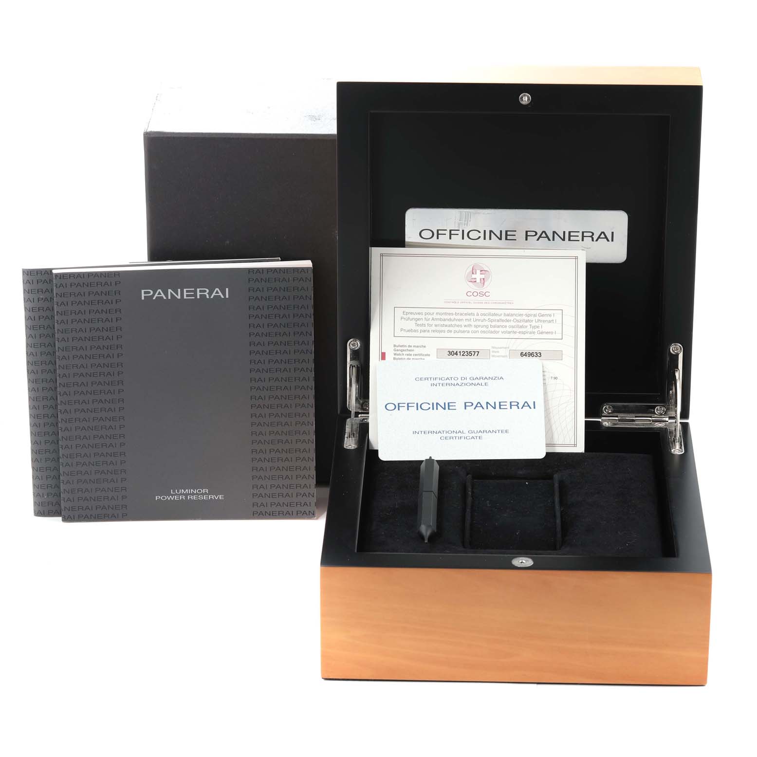 The image shows the open packaging box for a Panerai Luminor PAM00090 Men
s Stainless Steel Black Dial PAM00090 Men
s Stainless Steel Black Dial watch with accompanying manuals and certificates.