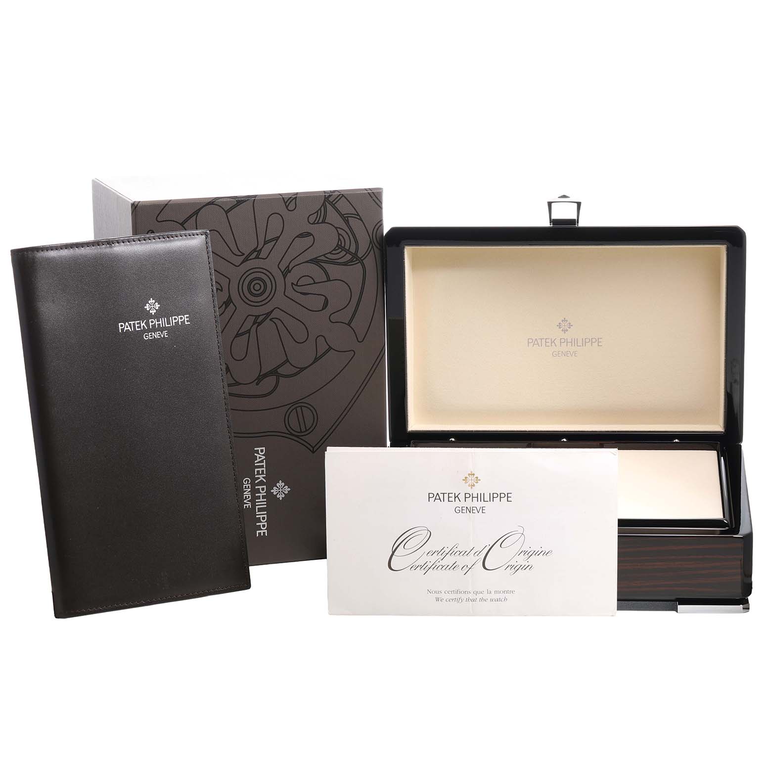 The image shows an open Patek Philippe Complications 5146R-001 Men's Rose Gold White Dial box with a certificate and branded packaging.