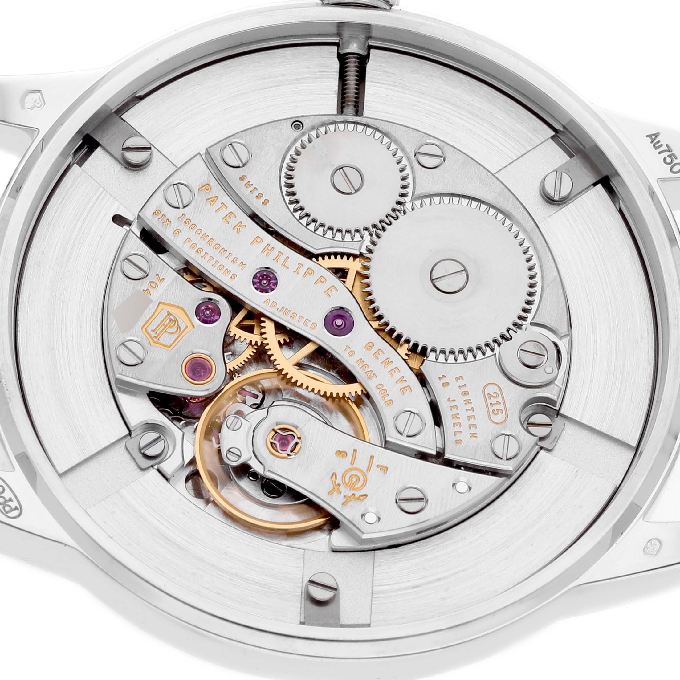 This image shows the back view of the Patek Philippe Calatrava 7122/200G Women's White Gold White Dial 7122/200G Women's White Gold White Dial watch, highlighting its intricate movement and mechanical parts.