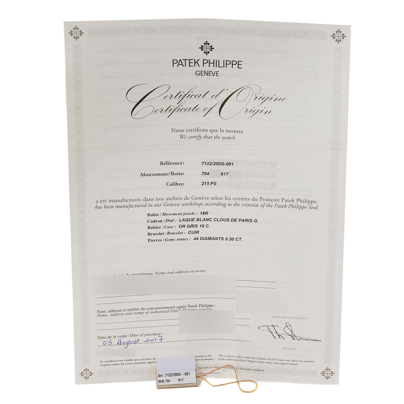 The image shows a Certificate of Origin for the Patek Philippe Calatrava 7122/200G Women's White Gold White Dial 7122/200G Women's White Gold White Dial model and its identification tag.