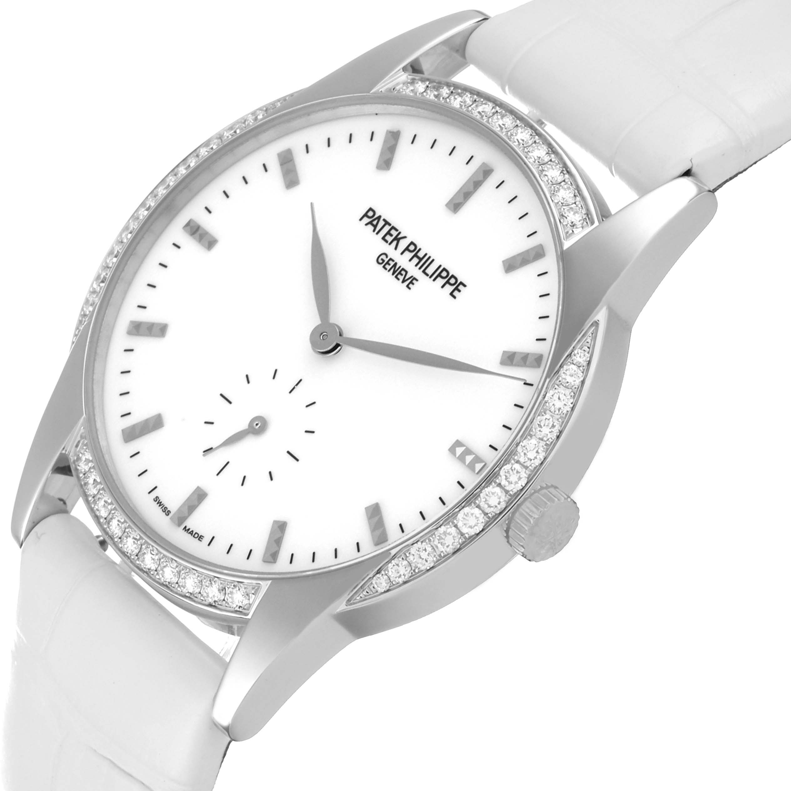 The image shows a Patek Philippe Calatrava 7122/200G Women's White Gold White Dial 7122/200G Women's White Gold White Dial watch at a tilted angle, highlighting its dial, bezel, and crown.