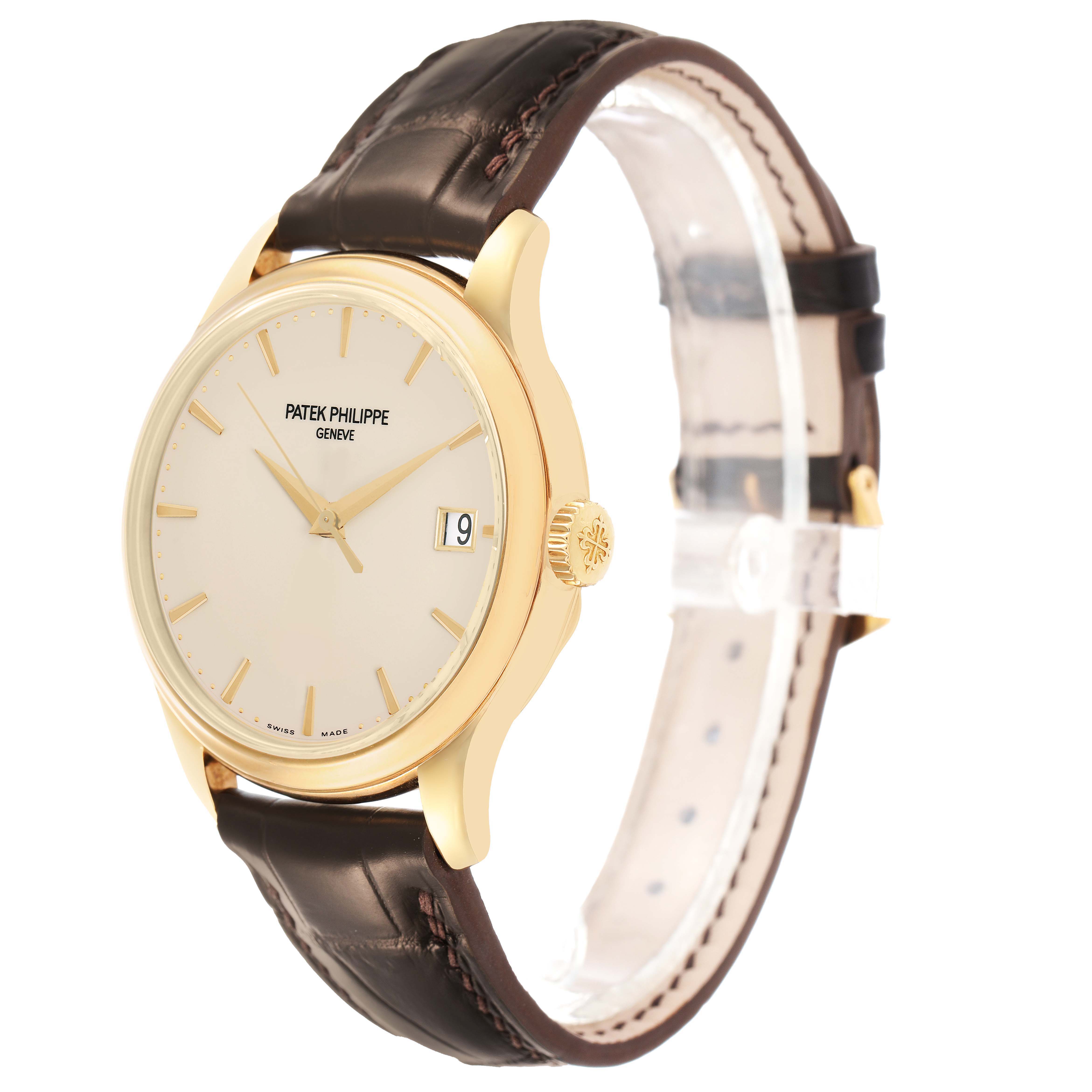 The Patek Philippe Calatrava 5227J Mens Yellow Gold White Dial watch is shown at a side angle, highlighting the dial, crown, case, and leather strap.