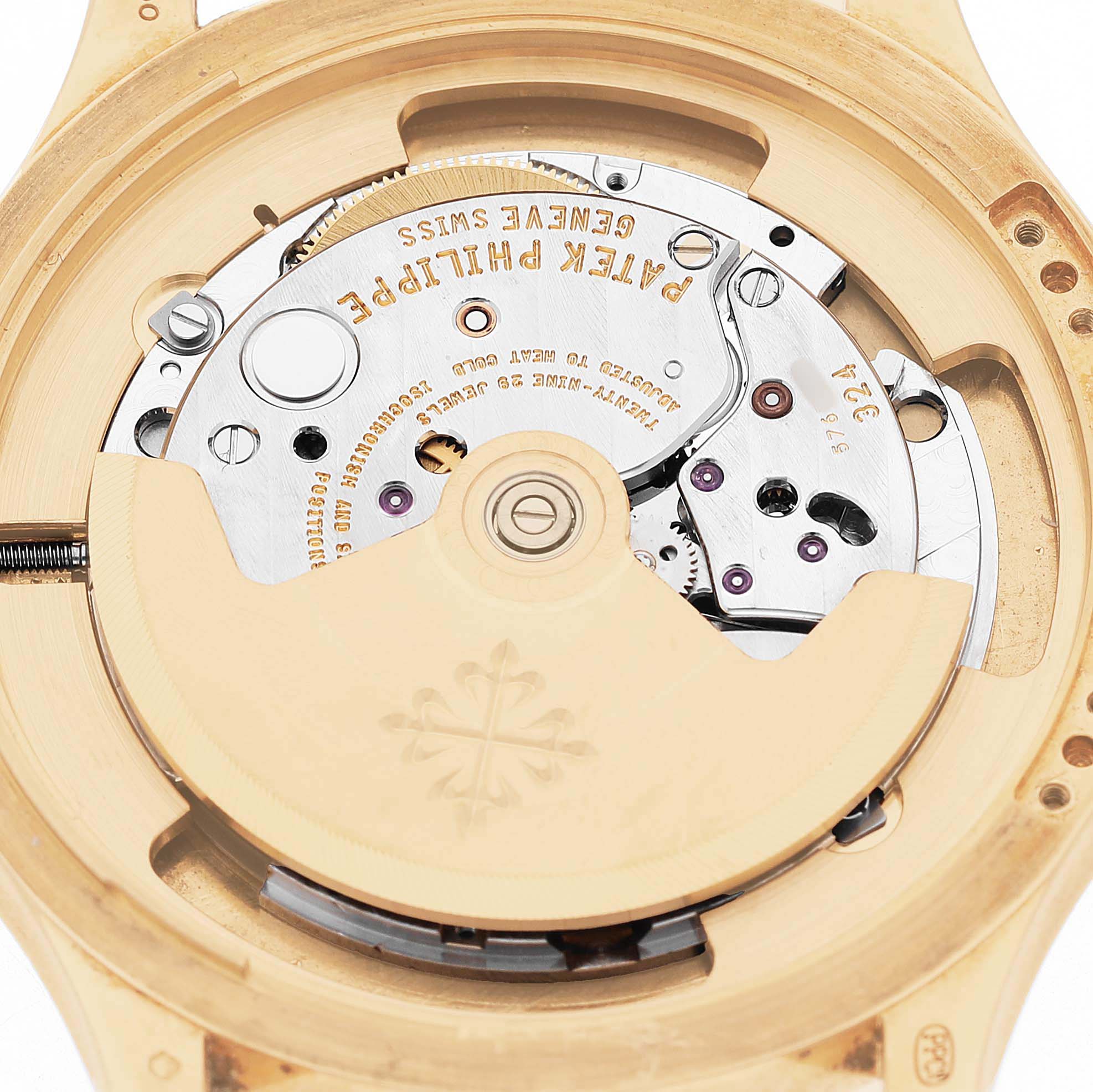 The image shows the movement and rotor of a Patek Philippe Calatrava 5227J Men's Yellow Gold White Dial watch from a rear angle.