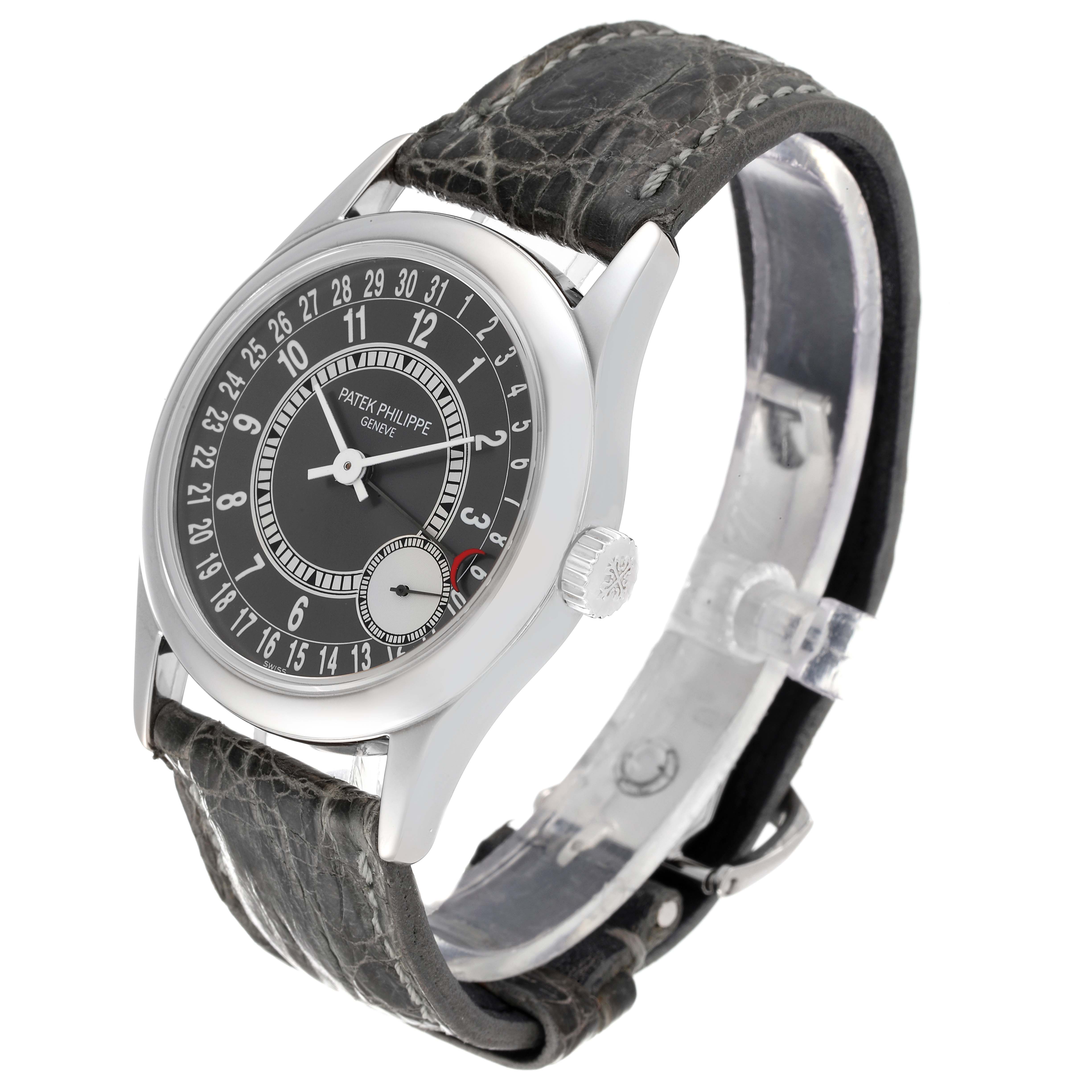 The Patek Philippe Calatrava 6000G Men's White Gold Grey Dial 6000G Men's White Gold Grey Dial watch is shown at a slight angle, highlighting the face, crown, and strap.