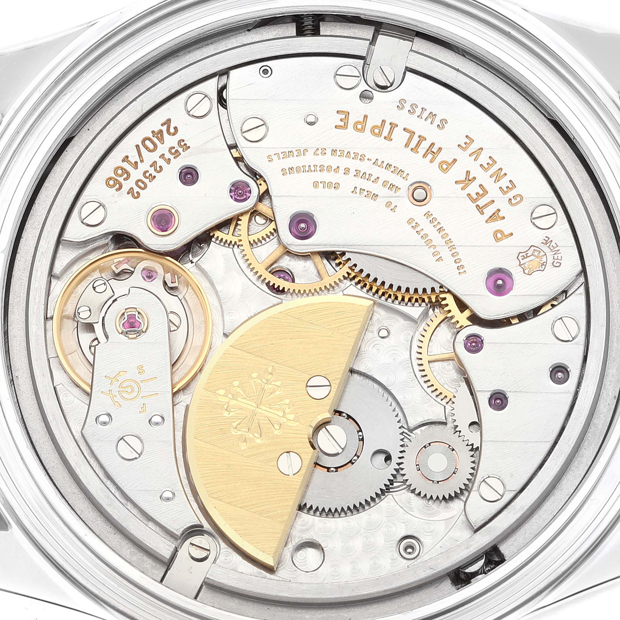 This image shows the intricate movement mechanism of a Patek Philippe Calatrava 6000G Men's White Gold Grey Dial 6000G Men's White Gold Grey Dial watch from a rear angle.