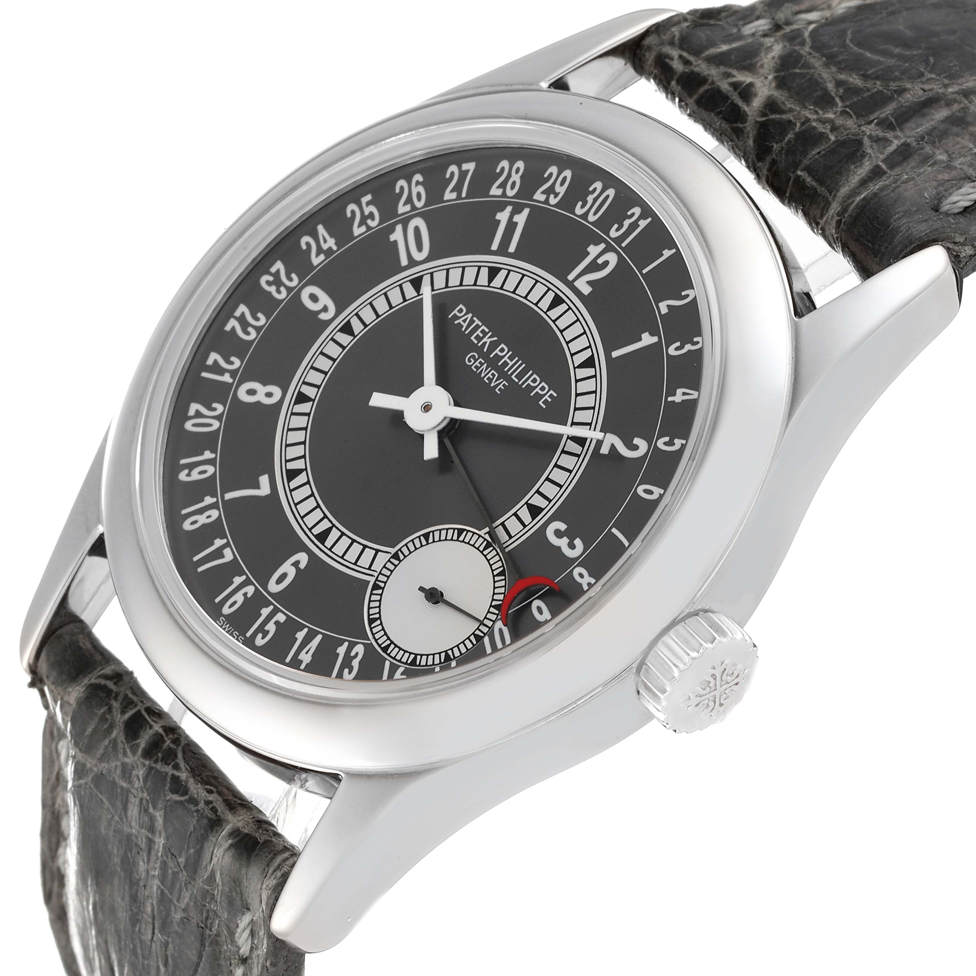 The Calatrava model by Patek Philippe is shown at an angled view highlighting the dial, crown, and strap.